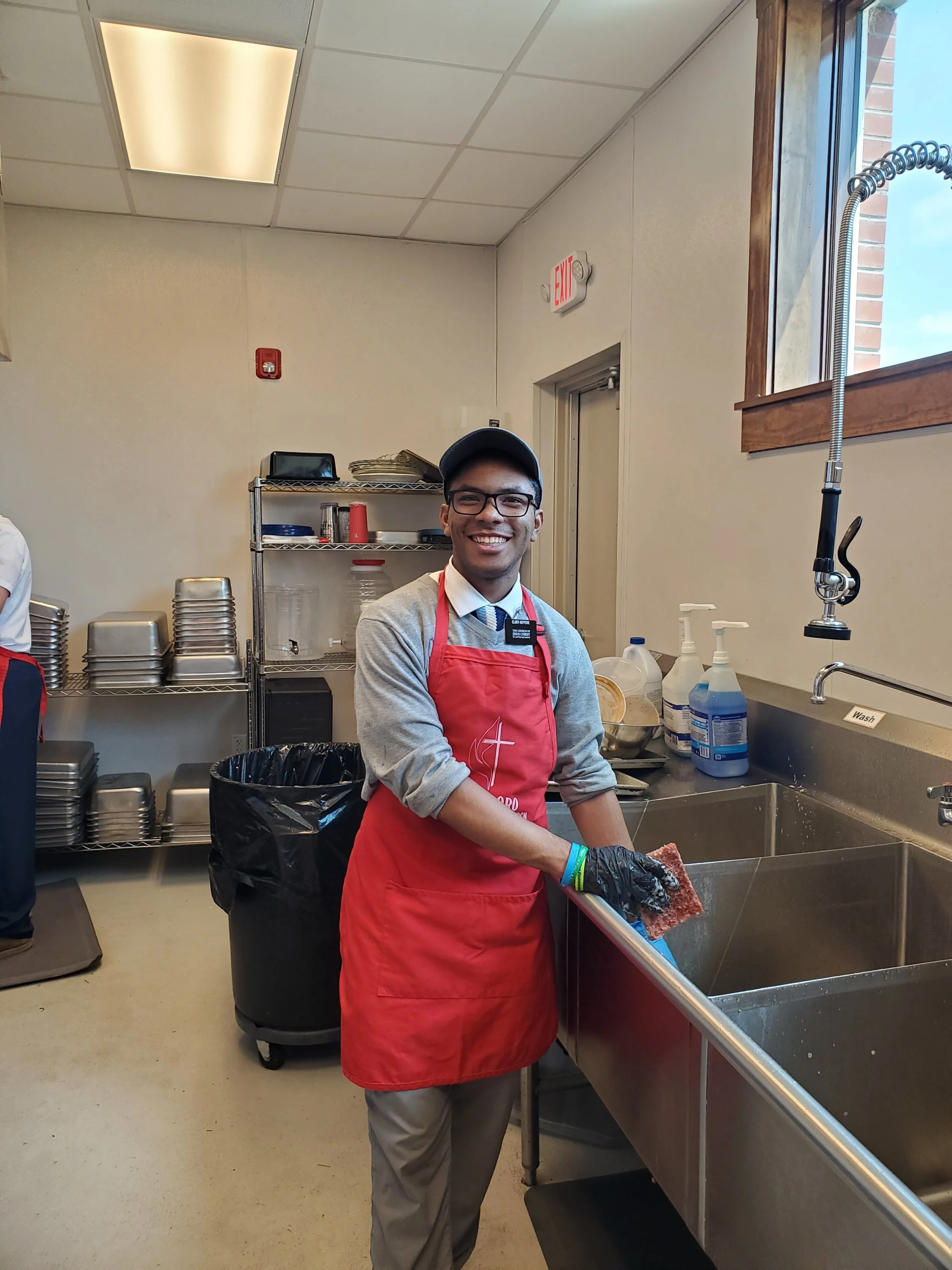 Elder Jeremy Gefferie dishwashing.jpg