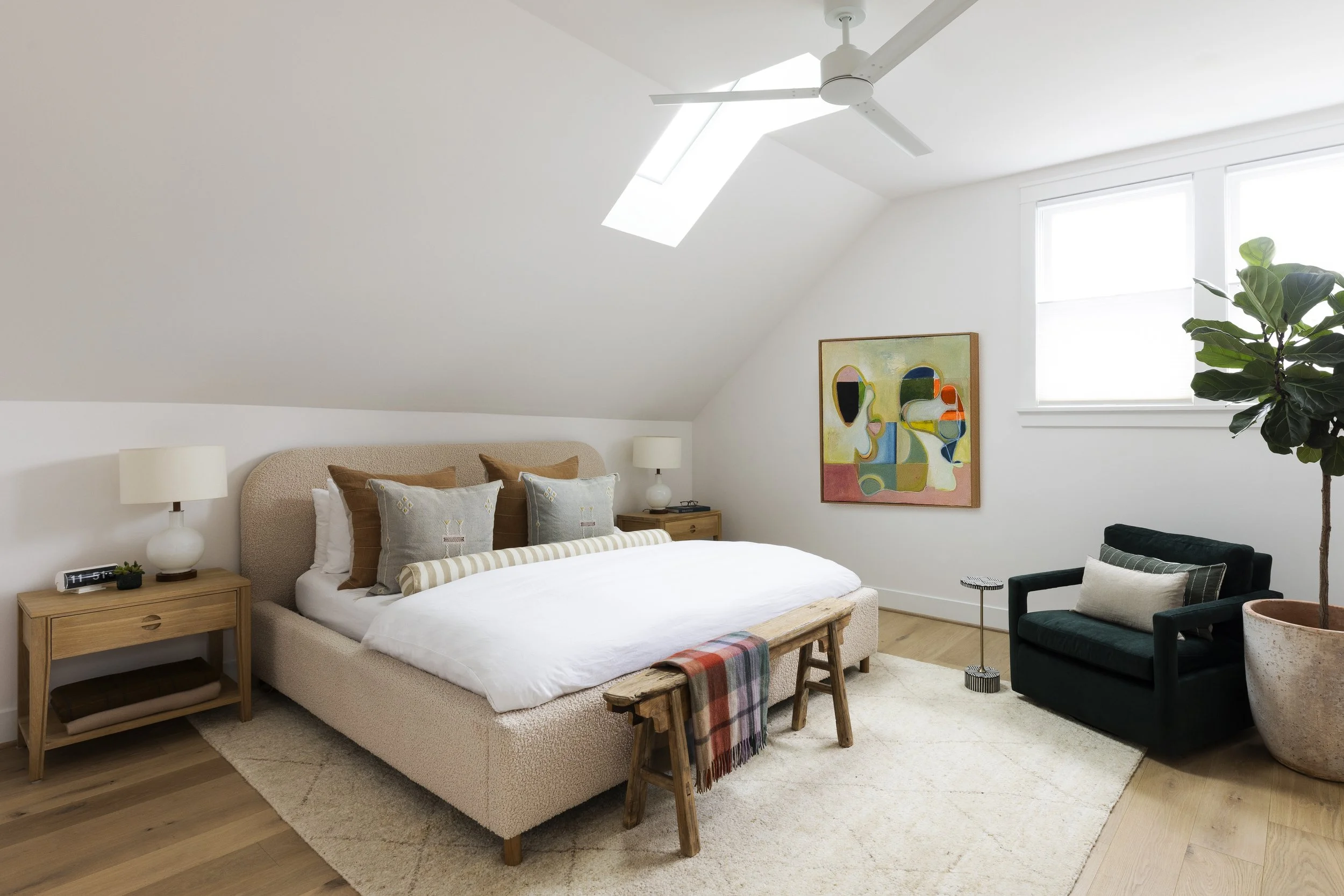 We_opted_for_a_bright_and_soothing_bedroom_design,_with_texture,_wood_pieces_to_warm_it,_and_pops_of copy.jpg