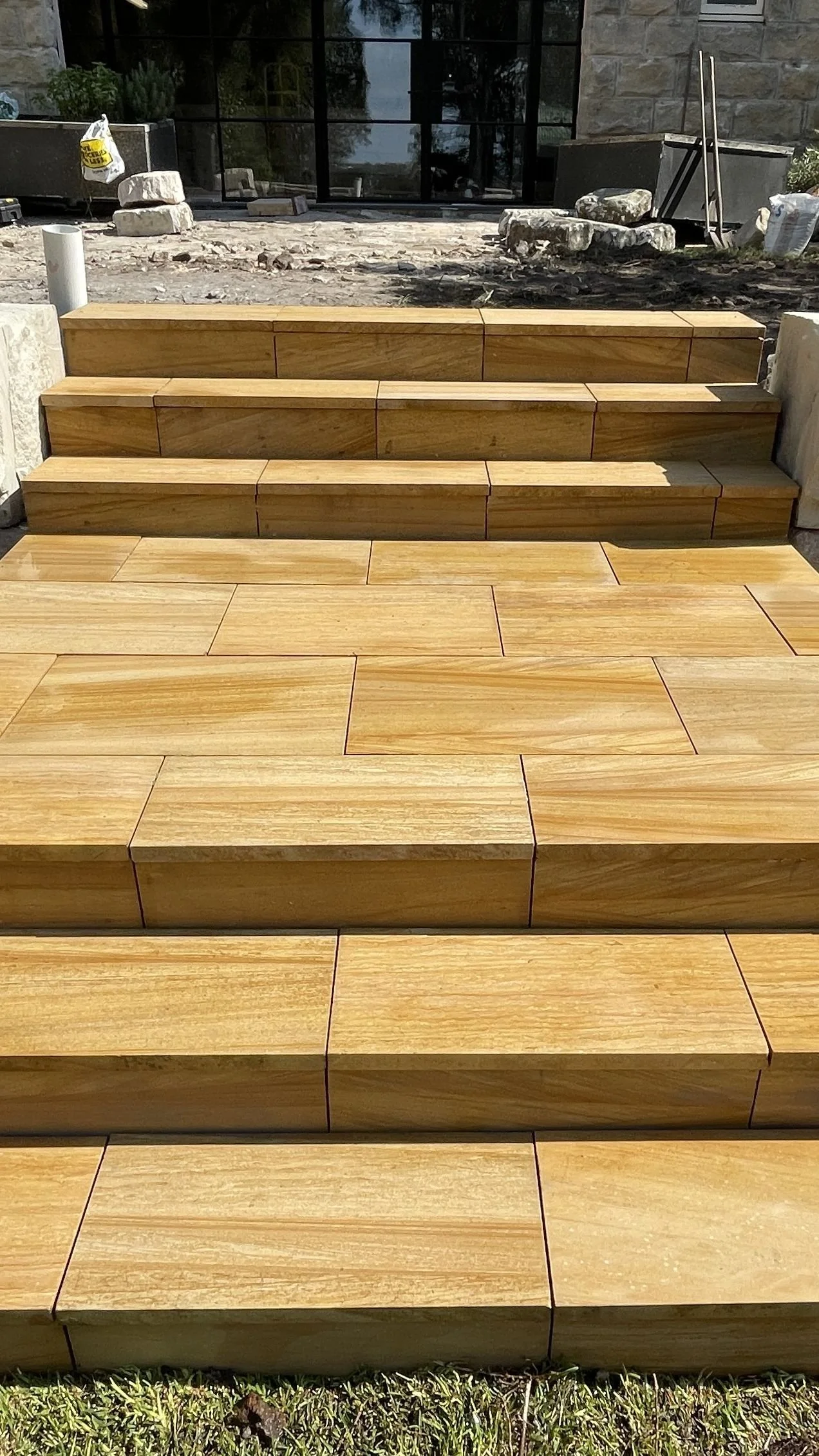 Beautiful sandstone log walls were constructed in Blakehurst, including this gorgeous stairs!