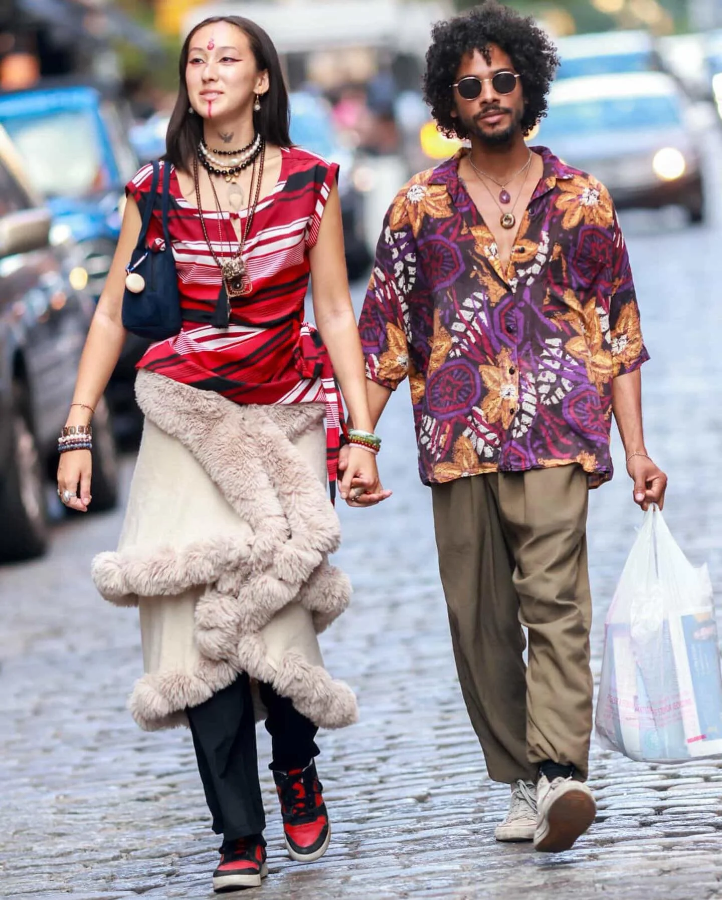 A moment captured by @watchingnewyork of us walking to @broomestreetganesh and coming from @nyganeshtemple where the priest greeted me as Durga Ma 🧲

What&rsquo;s in the plastic bag? 
Newsletters and images of Hindu Gods and Goddesses from the templ
