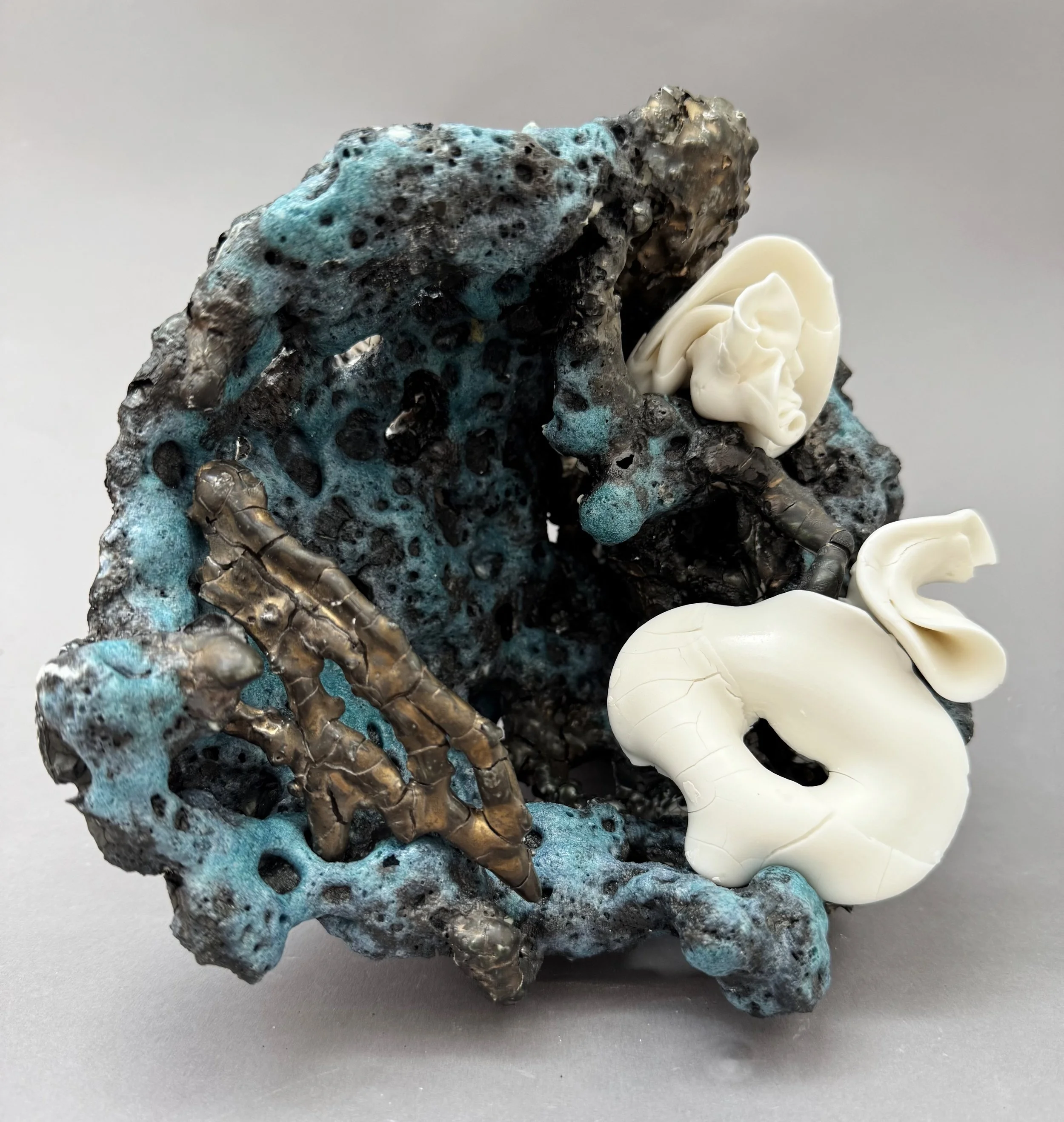 study for "Gniazdo", salvaged packing paper, porcelain slip, reactive slip, metal oxides, parian, electroformed components, 2025
