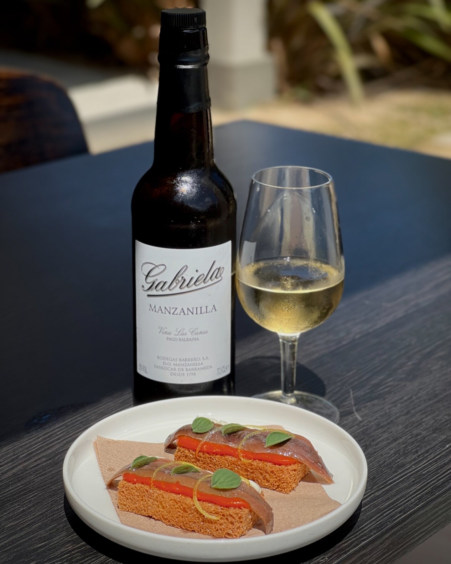 Consorcio Anchovy / Pane Fritte / Ricotta / Tomato
As the Spaniards would do, this snack with a glass of Gabriella Manzanilla Fino Sherry makes a wonderful pairing. 
A savoury &amp; briny palate with bright citrus balance that is light &amp; refreshi