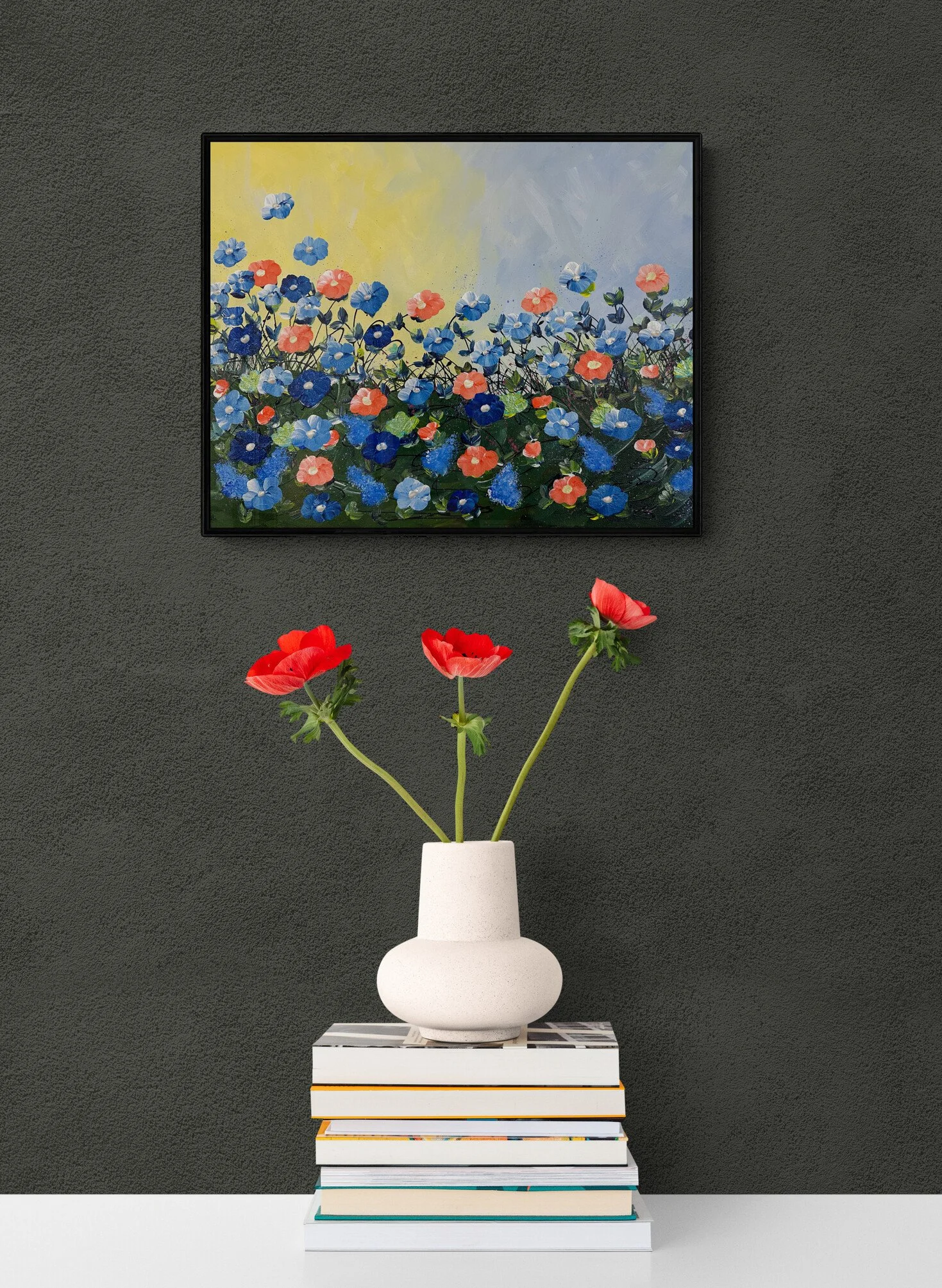 red-flowers-in-a-vase-sitting-on-books-3.jpg