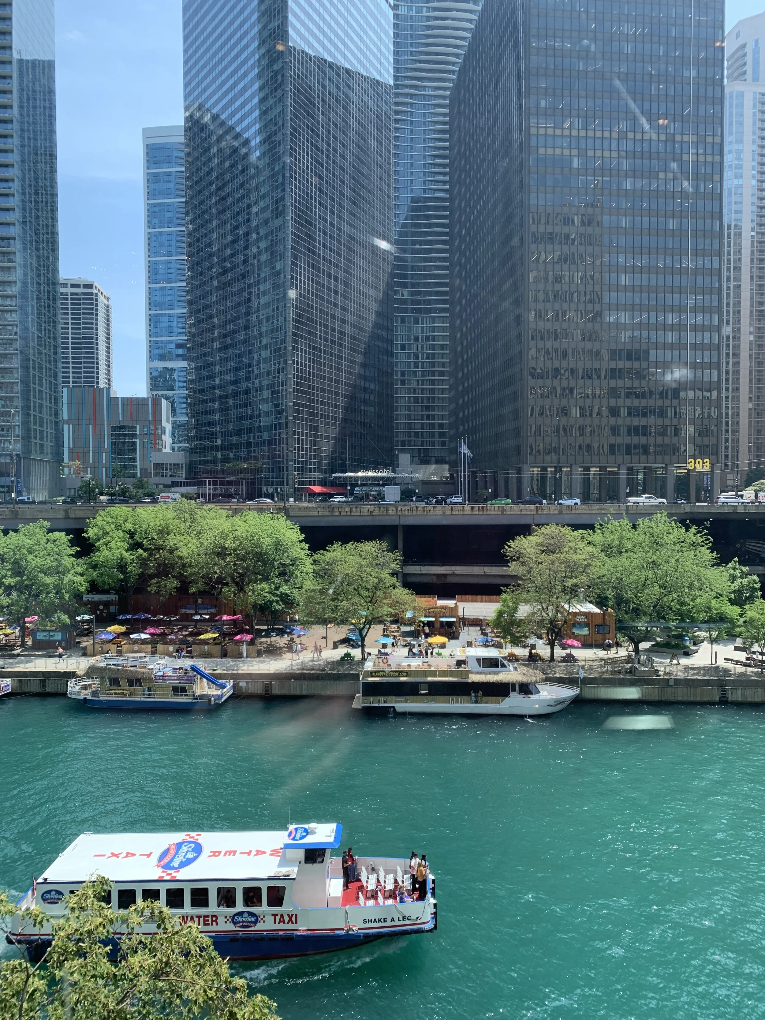 Boats on river along dowtown Chicago's Riverwalk