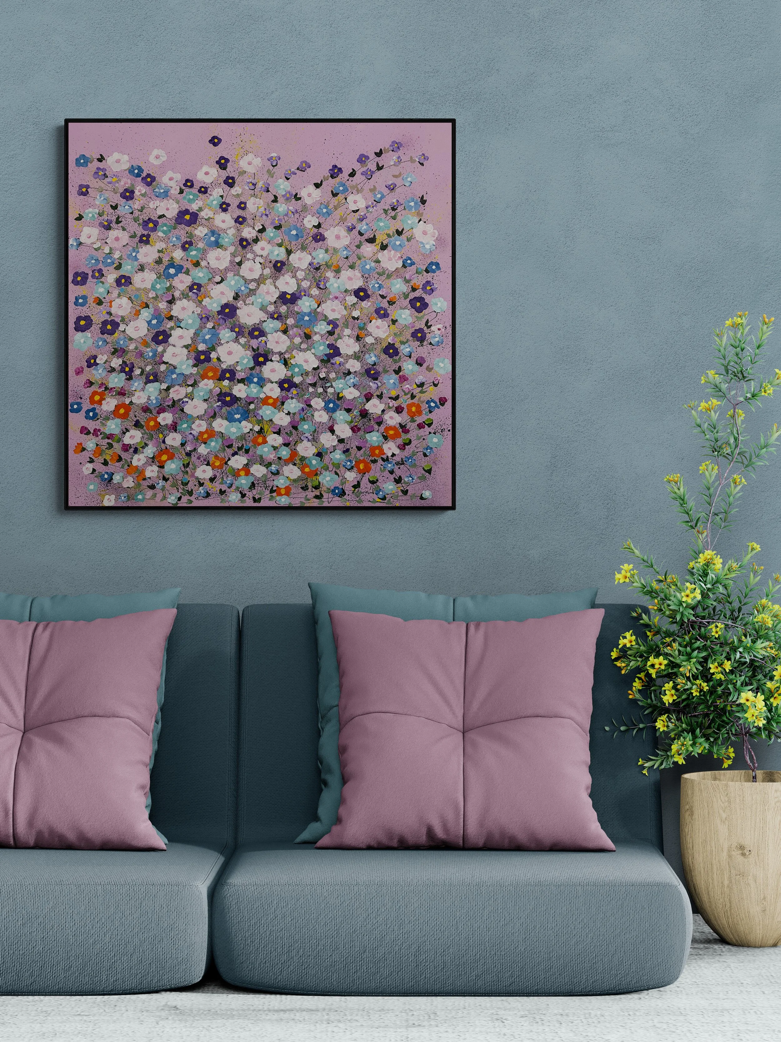 comfy-sofa-next-to-a-flowering-plant copy.jpg