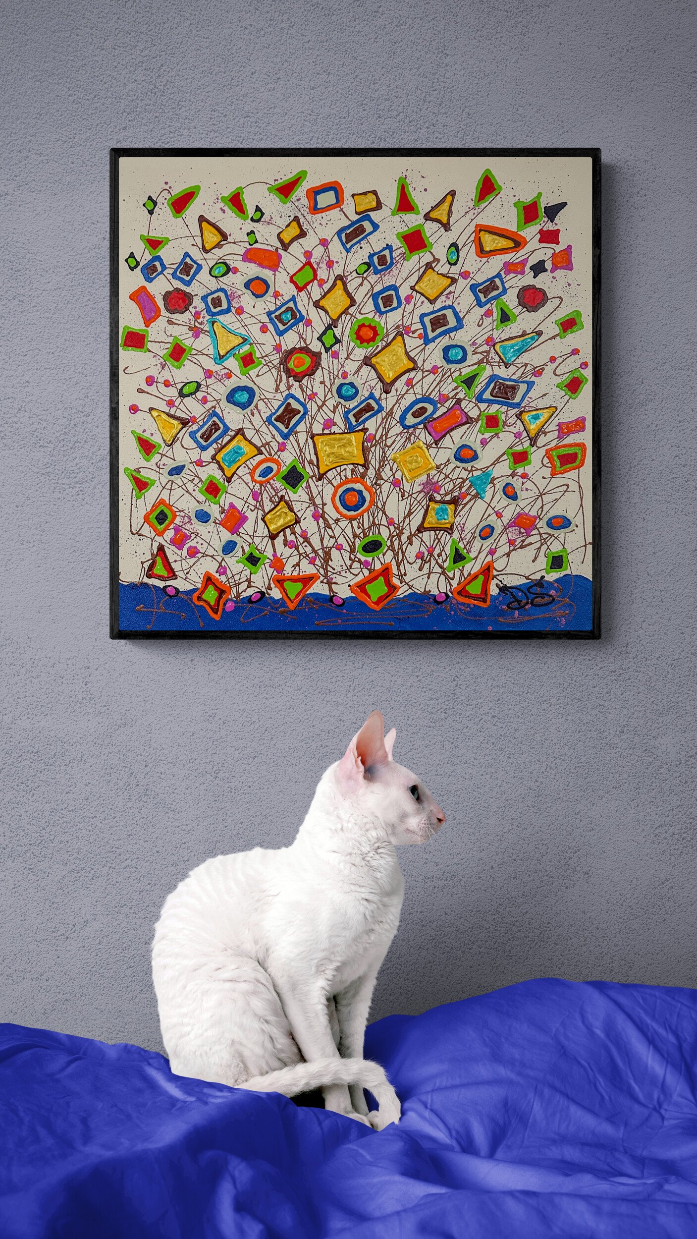 white-cat-sitting-on-a-bed copy.jpg