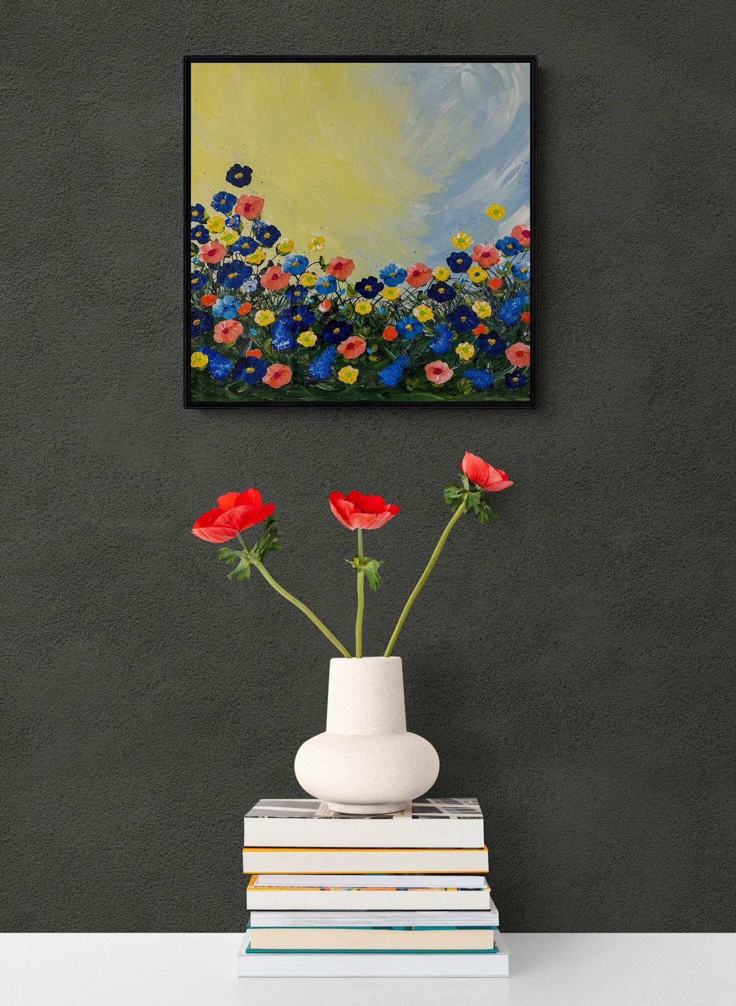 red-flowers-in-a-vase-sitting-on-books.jpg
