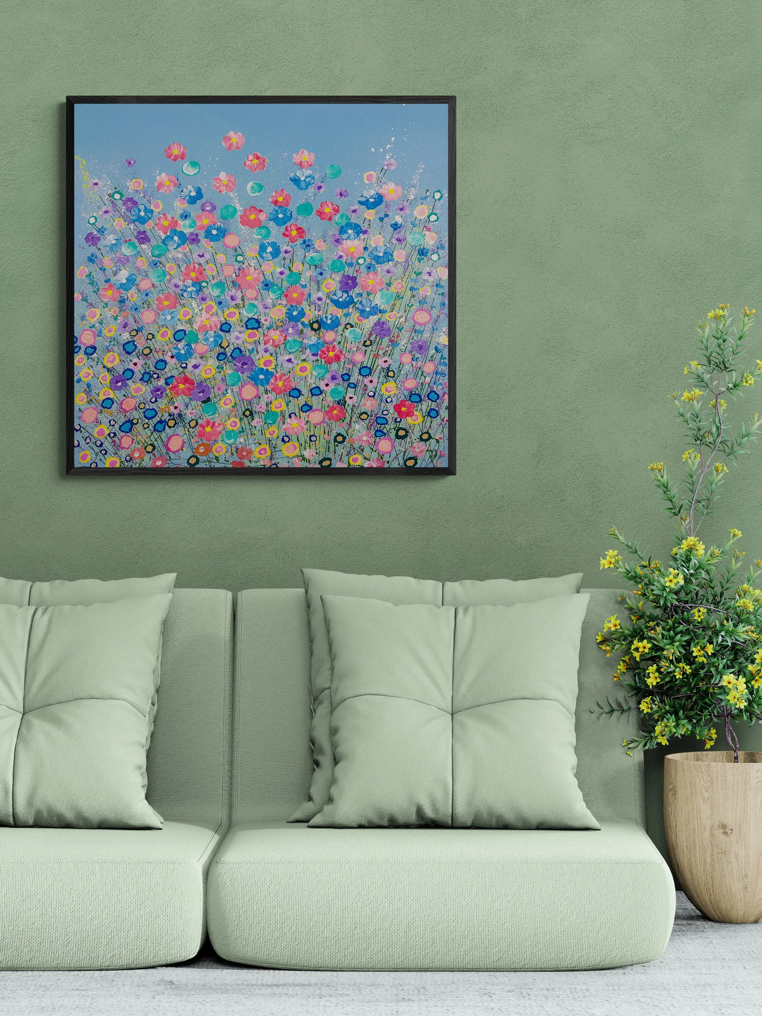 comfy-sofa-next-to-a-flowering-plant.jpg