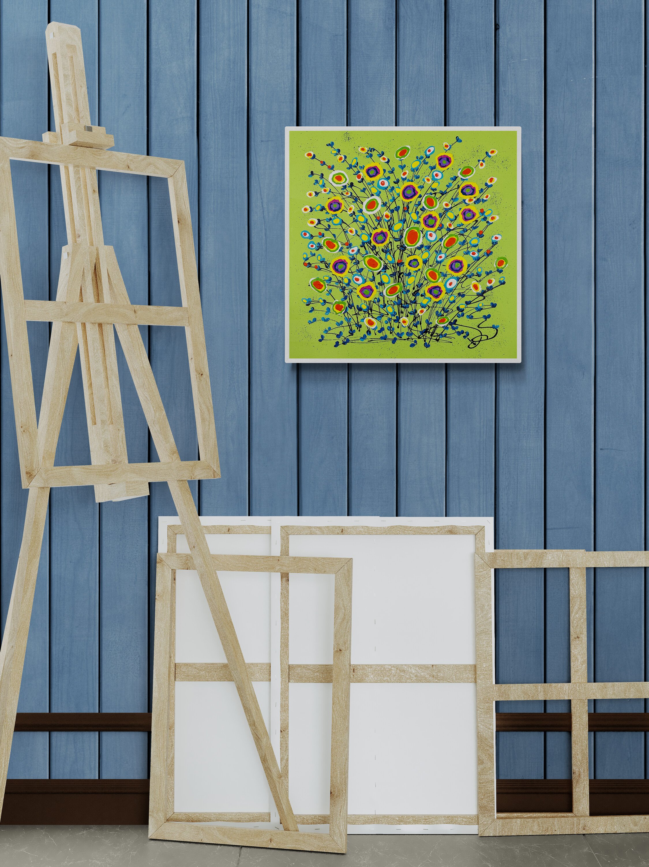 artists-easel-and-frames-next-to-a-wall.jpg