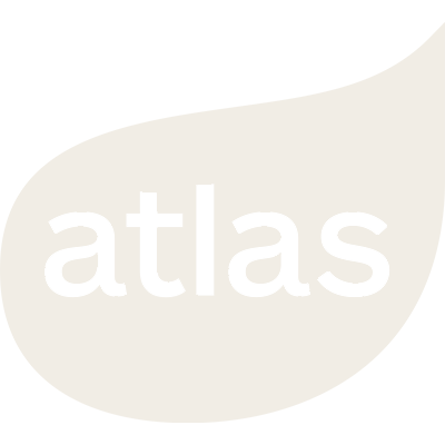 Logo with the word 'atlas' in lowercase black letters on a white teardrop-shaped background.