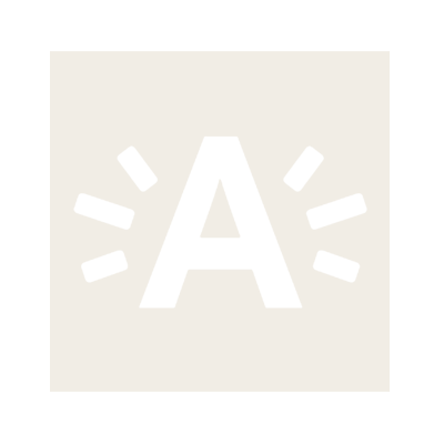 A white letter 'A' with radiating lines around it, on a light beige background.