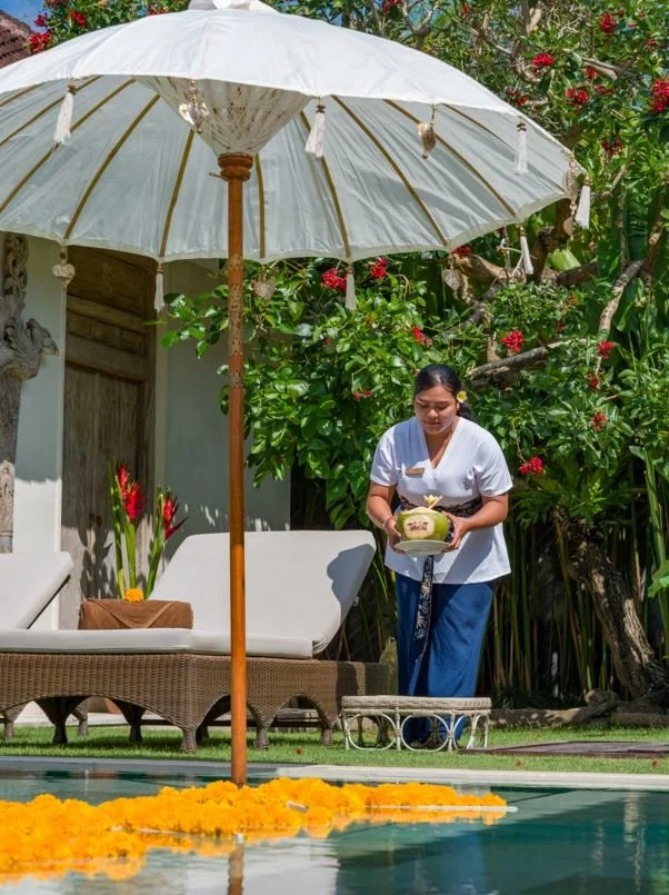 pool, sun lounger, staff - Nyoman