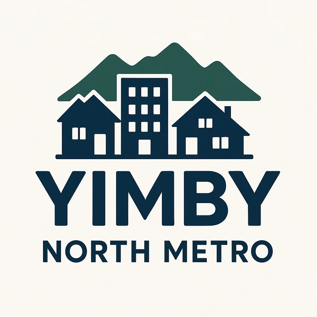 Logotipo de YIMBY North Metro con casas y montañas estilizadas.