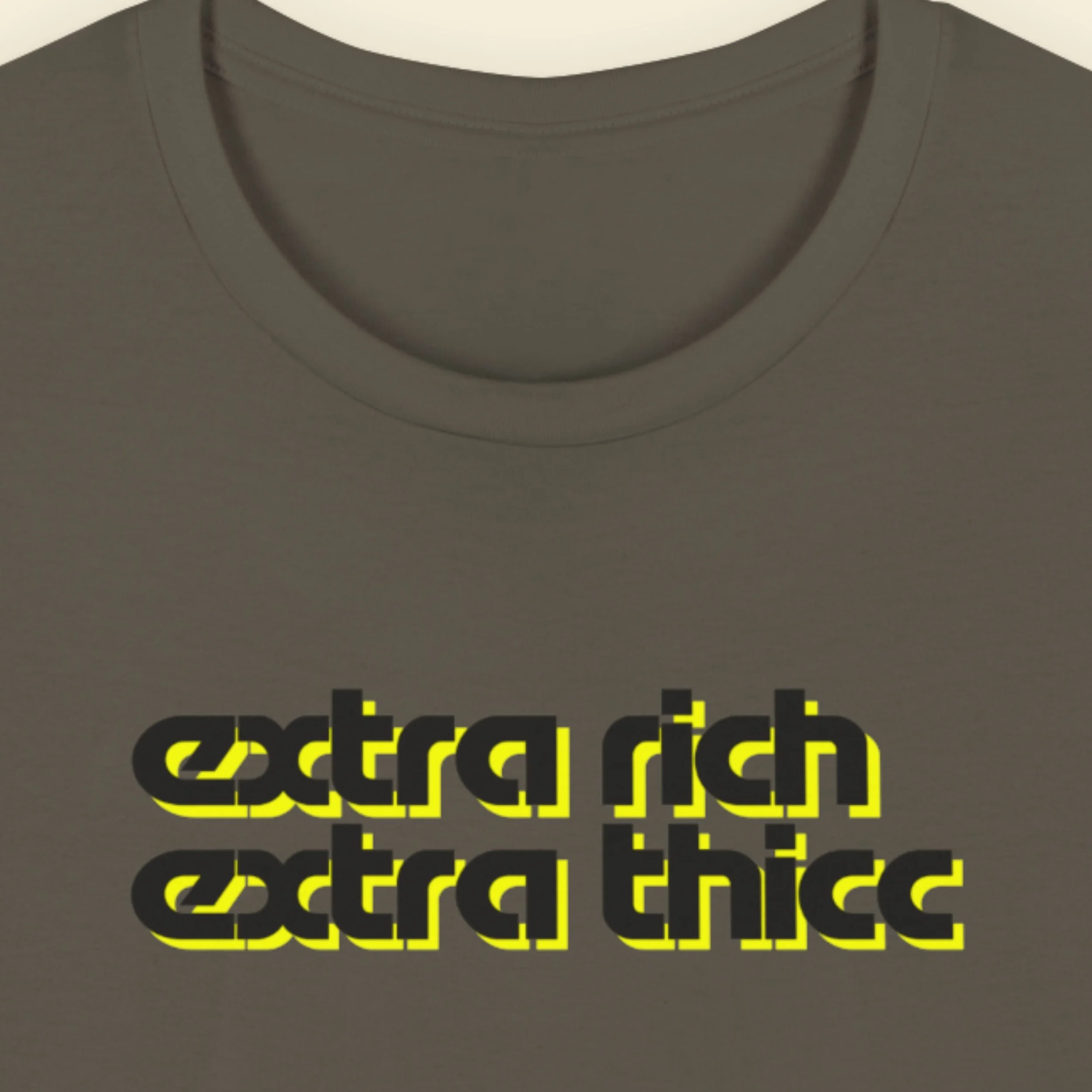Army green t-shirt with 'extra rich extra thicc' text in black and yellow on a beige background.