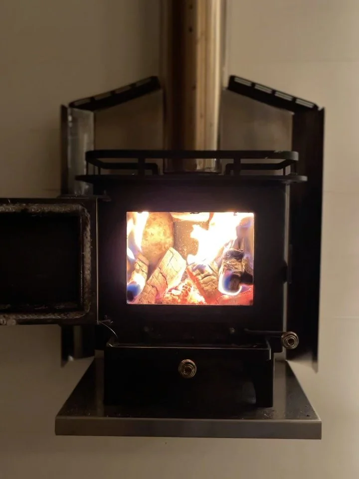 Birthday morning. Bringing in the day with fire, twinkle lights, breakfast, coffee, journaling, and clutter everywhere.