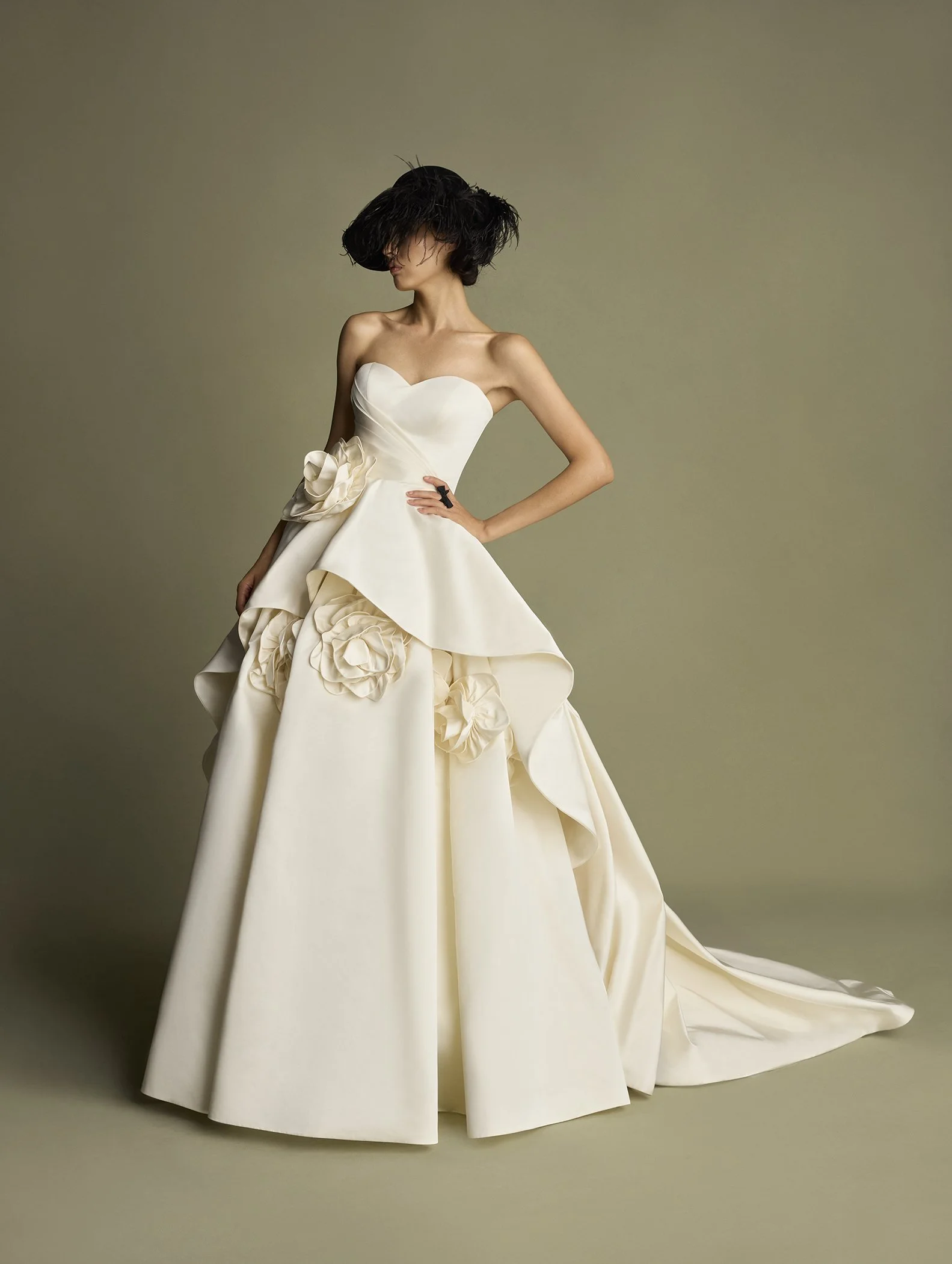 Idan Cohen bridal gown featuring structured corsetry and hand embellishment