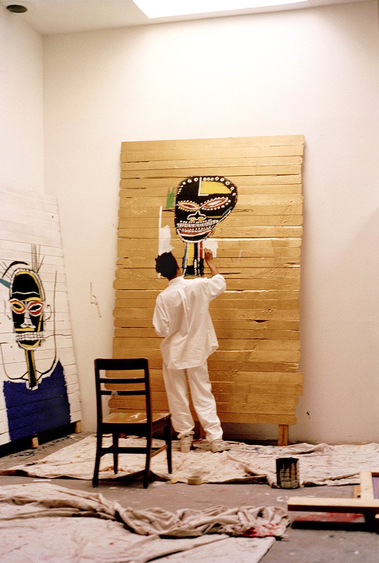 Jean-Michel Basquiat working at his Market Street studio in Venice, California in 1984.&nbsp;