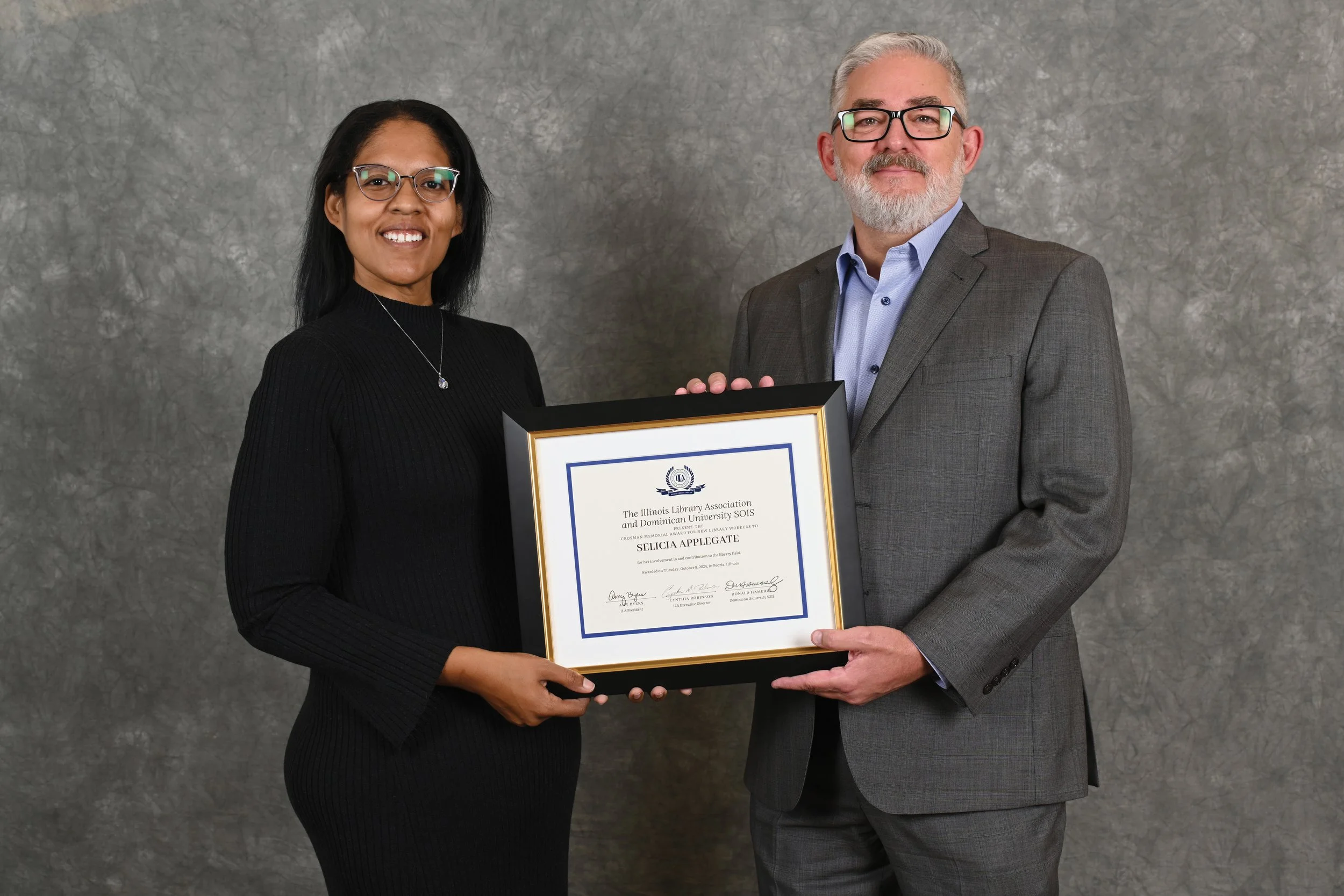 Selicia receiving the Crosman Memorial Award