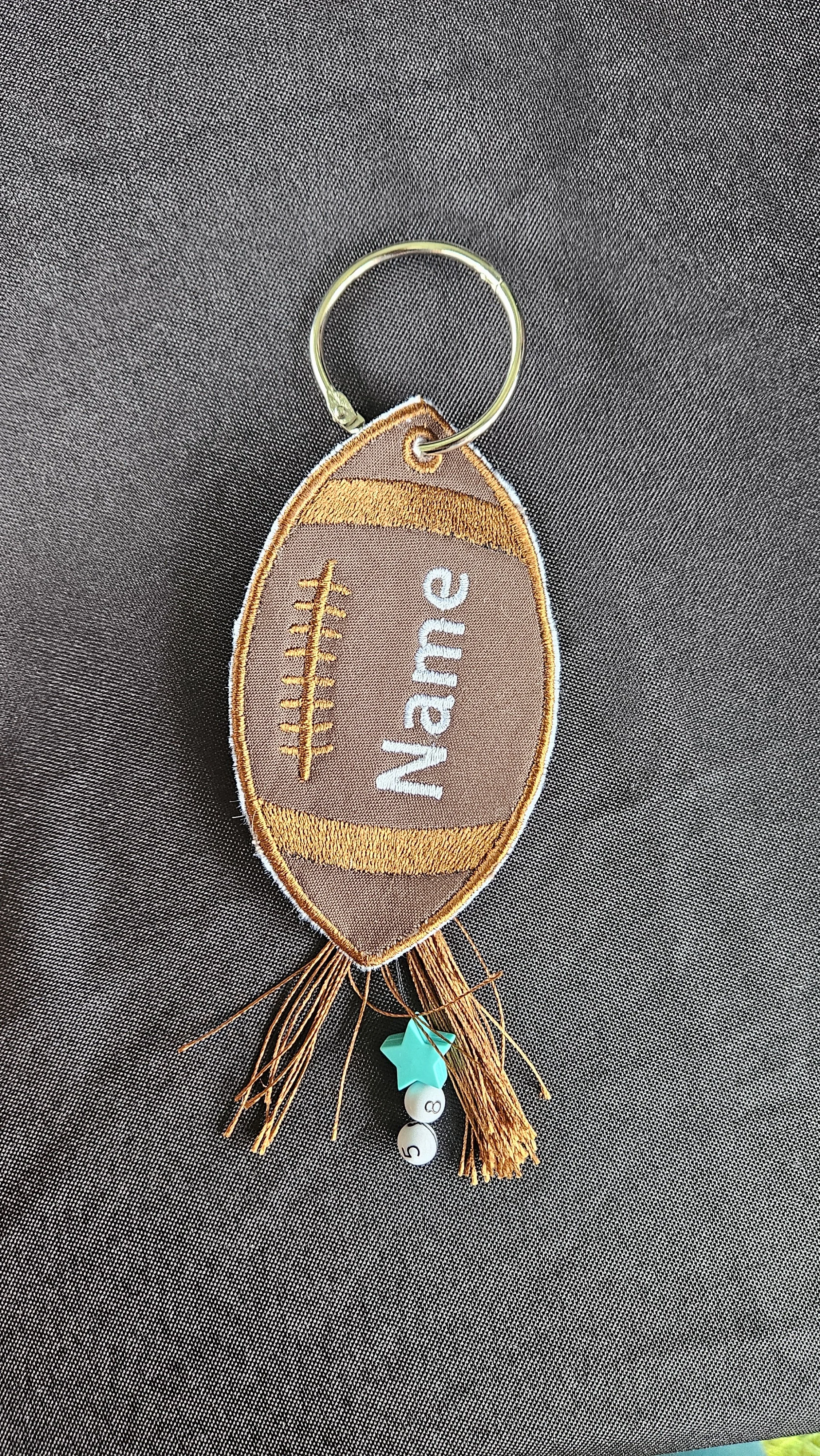 simply-multifarious-embroidered-bag-tag-sports-classroom-football.jpg