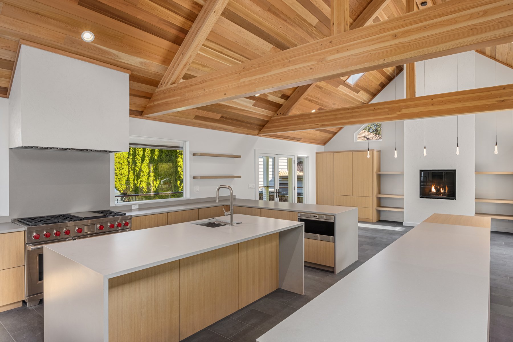 Full kitchen and dining room remodel with exposed wood beam ceiling in Poulsbo WA - Vega Builders