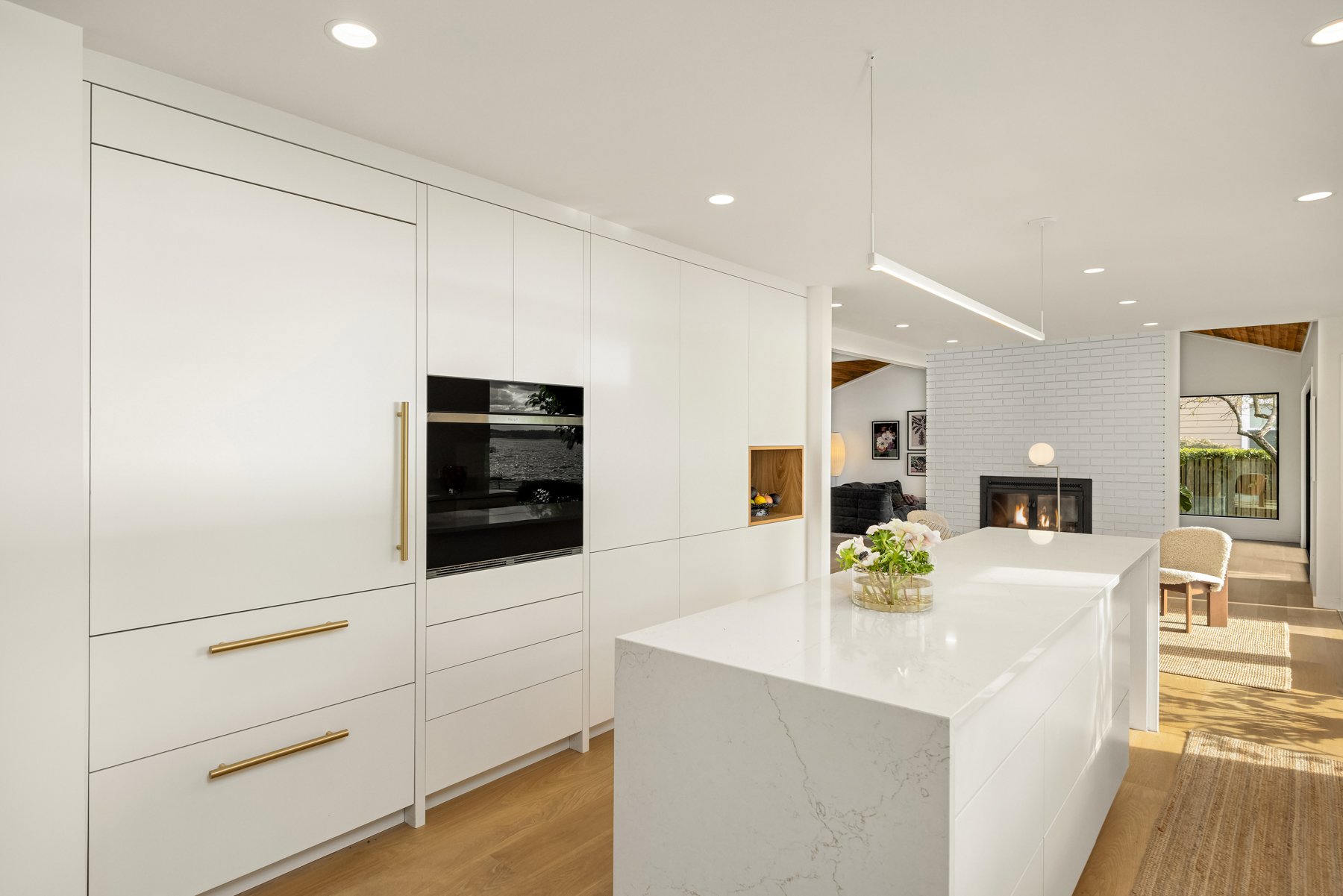 Kitchen remodel with gold fixtures and quartz counters, Bainbridge Island WA - Vega Builders