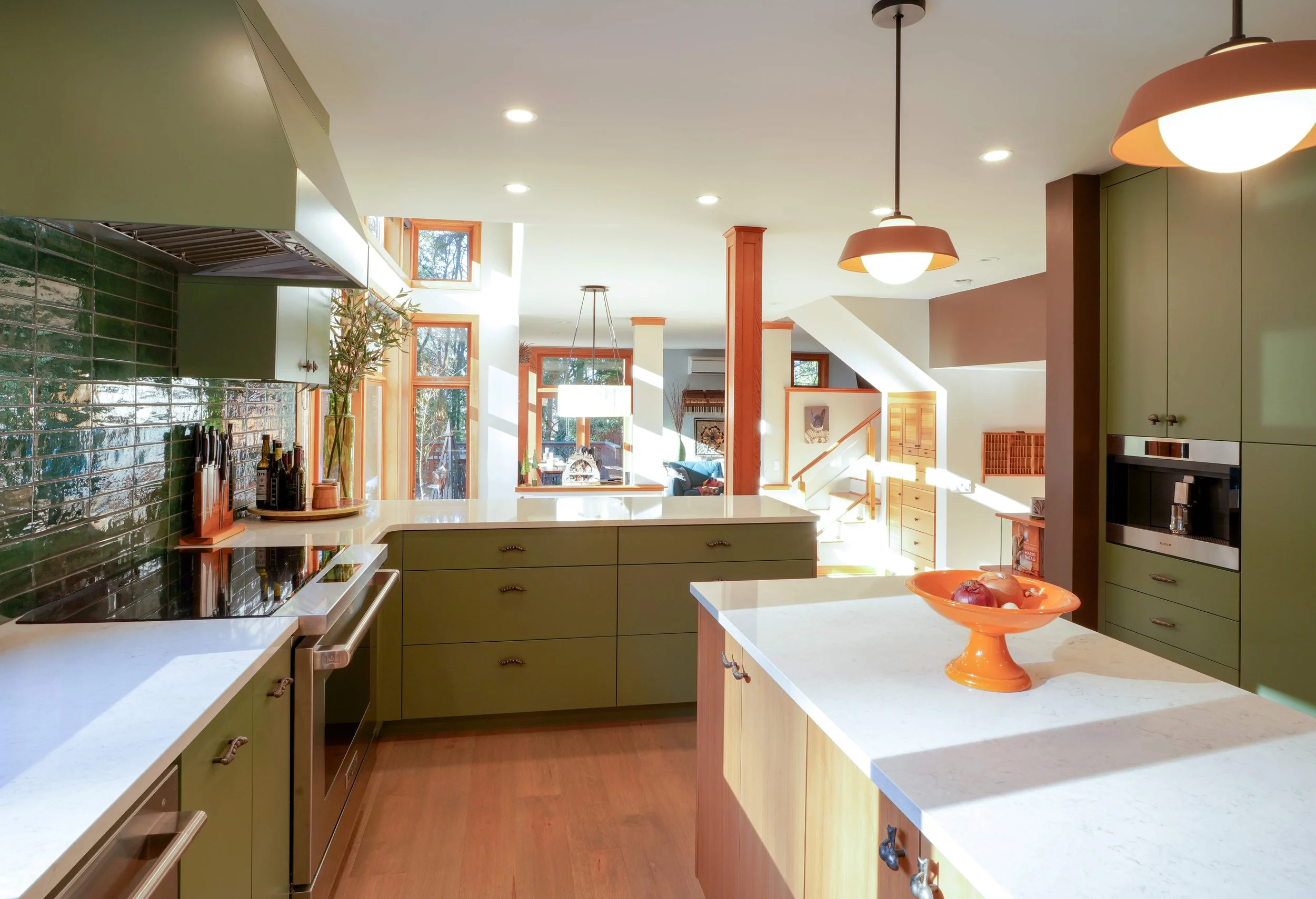 Kitchen remodel with green cabinets and tile backsplash,  Bainbridge Island - Vega Builders