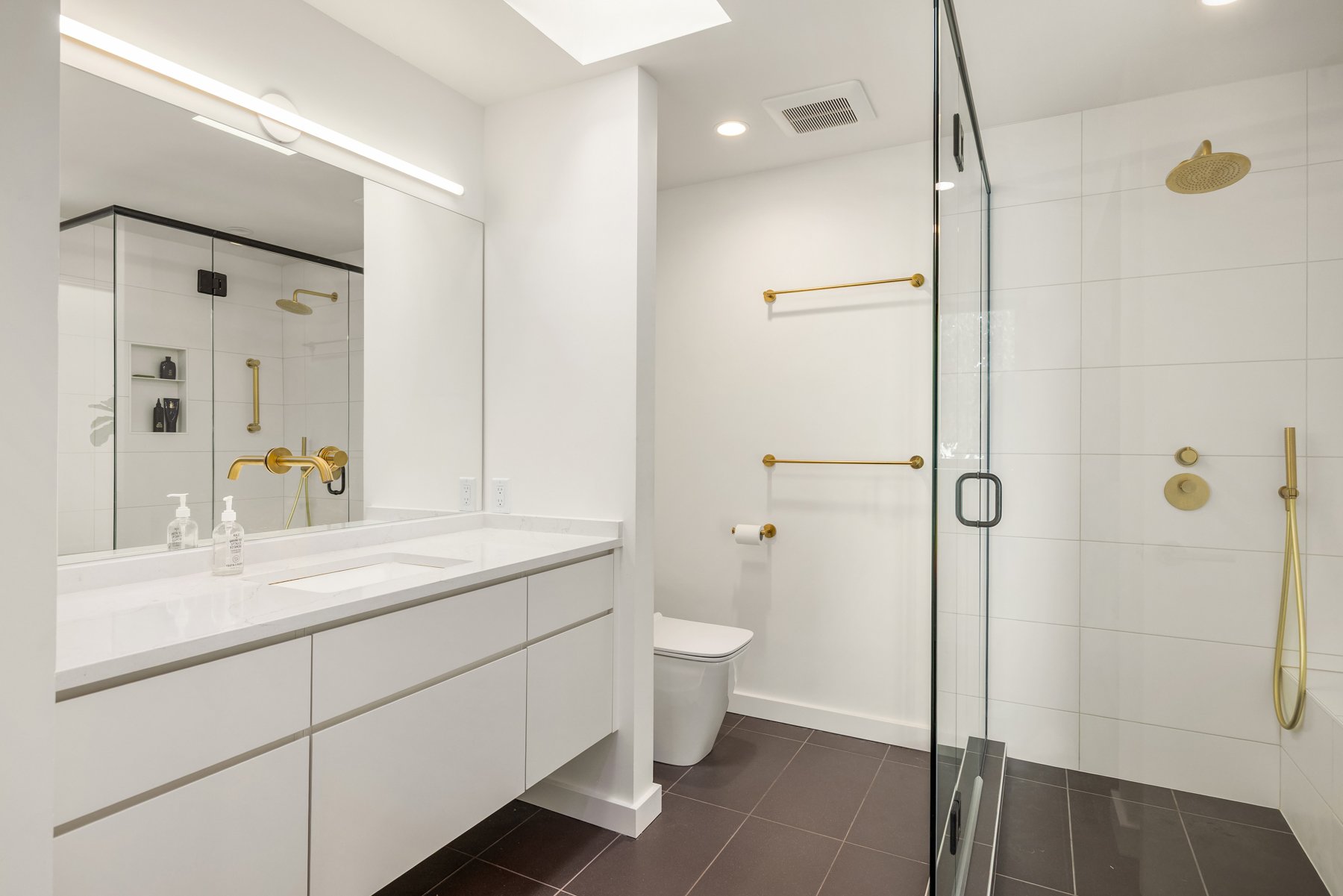 Kitchen remodel with gold fixtures and quartz counters, Bainbridge Island WA - Vega Builders