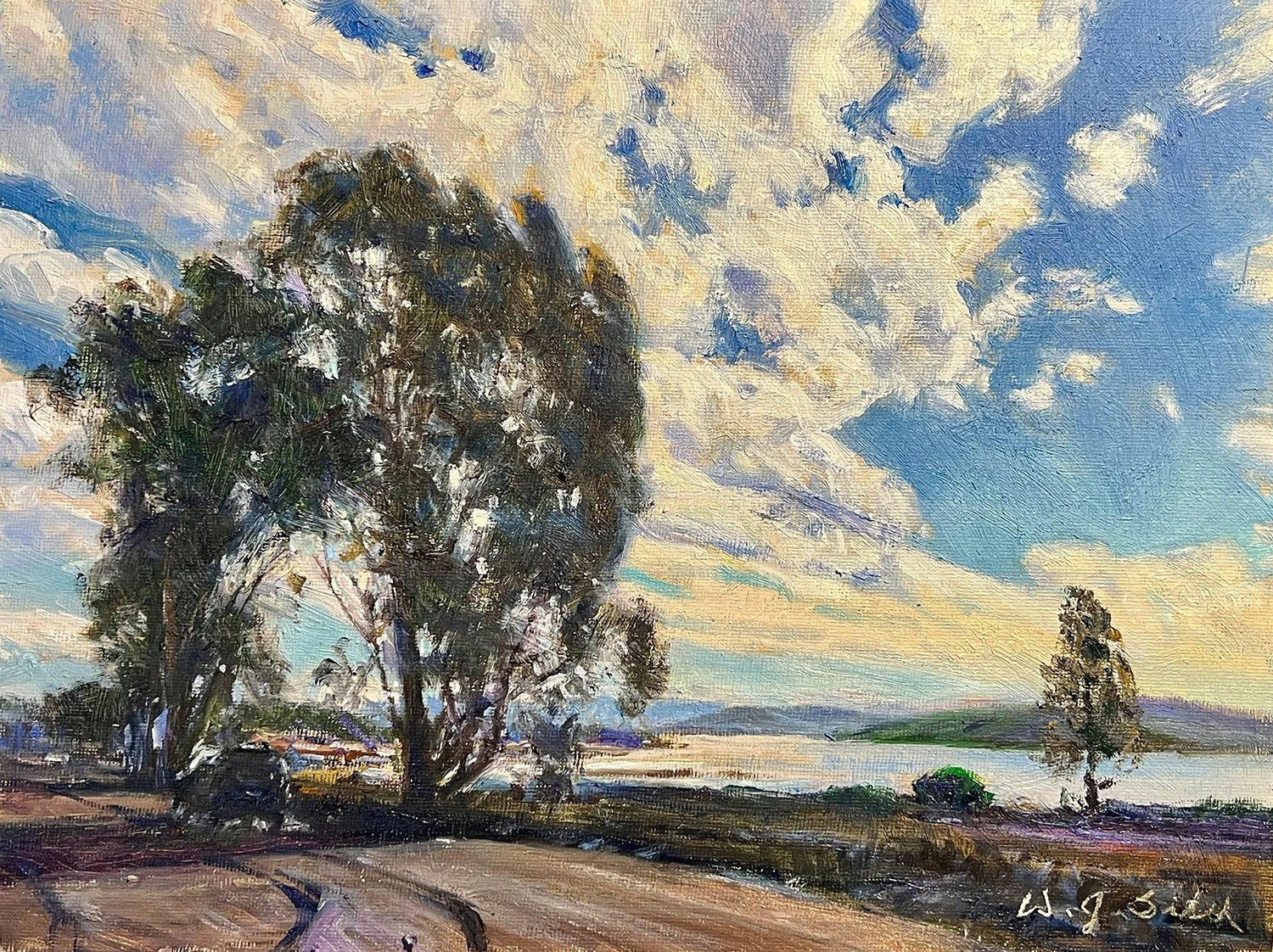 A landscape oil painting featuring a sky with scattered clouds, a few trees, a winding road, and a body of water in the distance, signed by the artist in the bottom right corner.