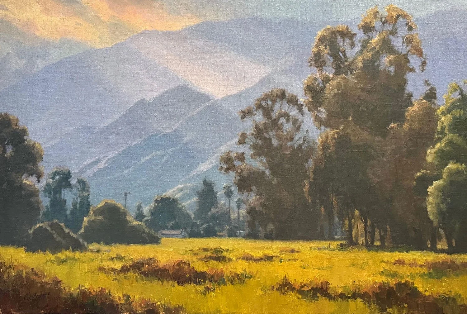 A landscape painting of a mountainous area with trees and a grassy field in the foreground, with mountains in the background under a sky with warm tones.