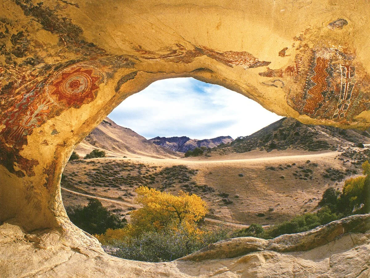 Text overlay on a landscape painting advertising an art exhibition featuring landscape paintings by 19 renowned artists from April 17 to August 9, 2026 at the Ojai Valley Museum.