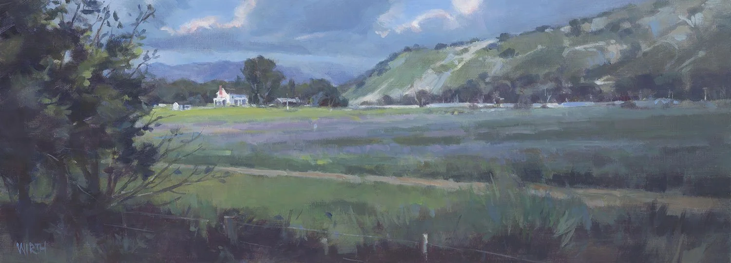 A landscape painting of a rural scene with rolling green hills, a field with lavender or purple crops, a white church with a steeple, trees, and a partly cloudy sky.