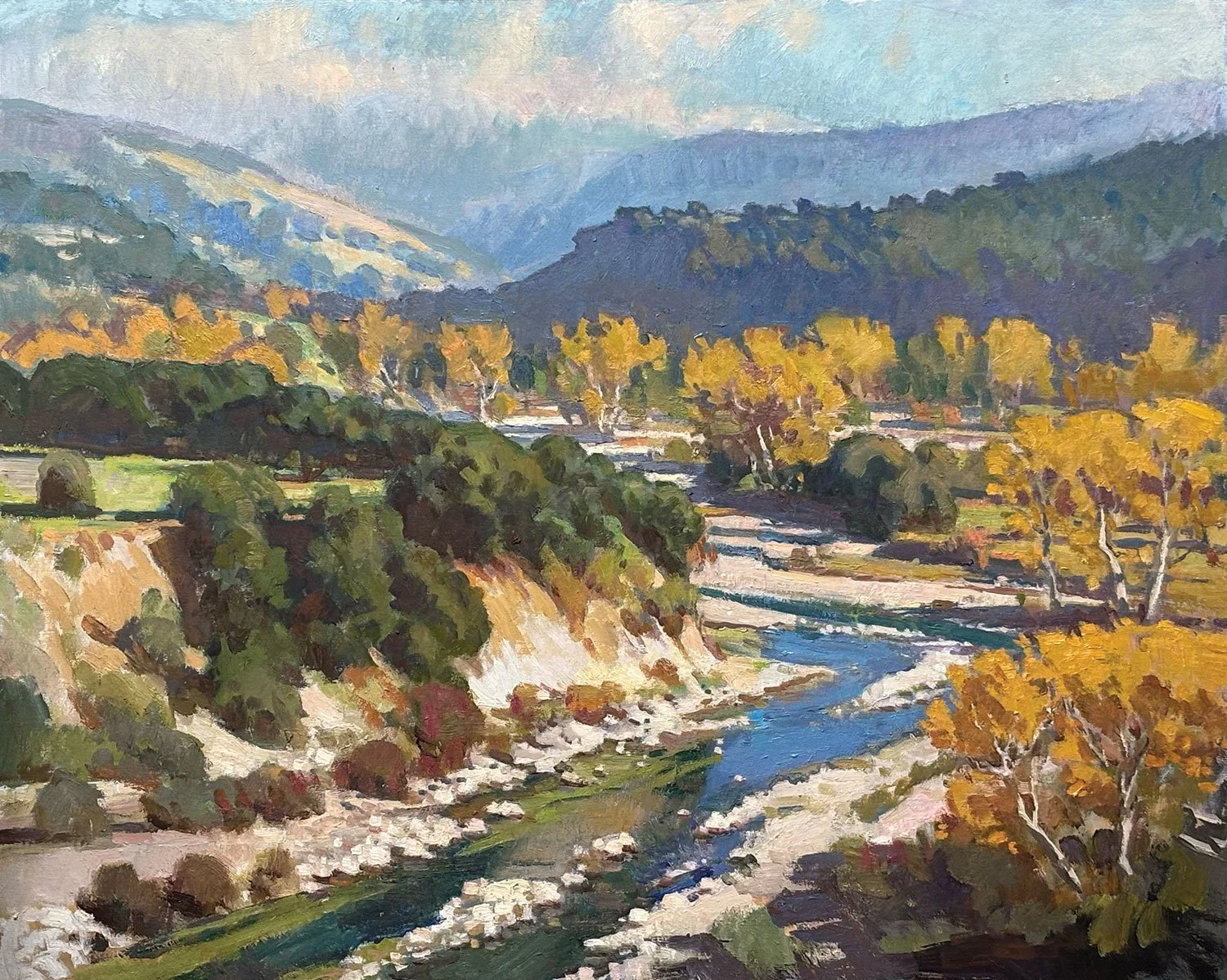 Landscape painting of a river winding through a valley with trees showing fall colors, green hills, and distant mountains under a blue sky.