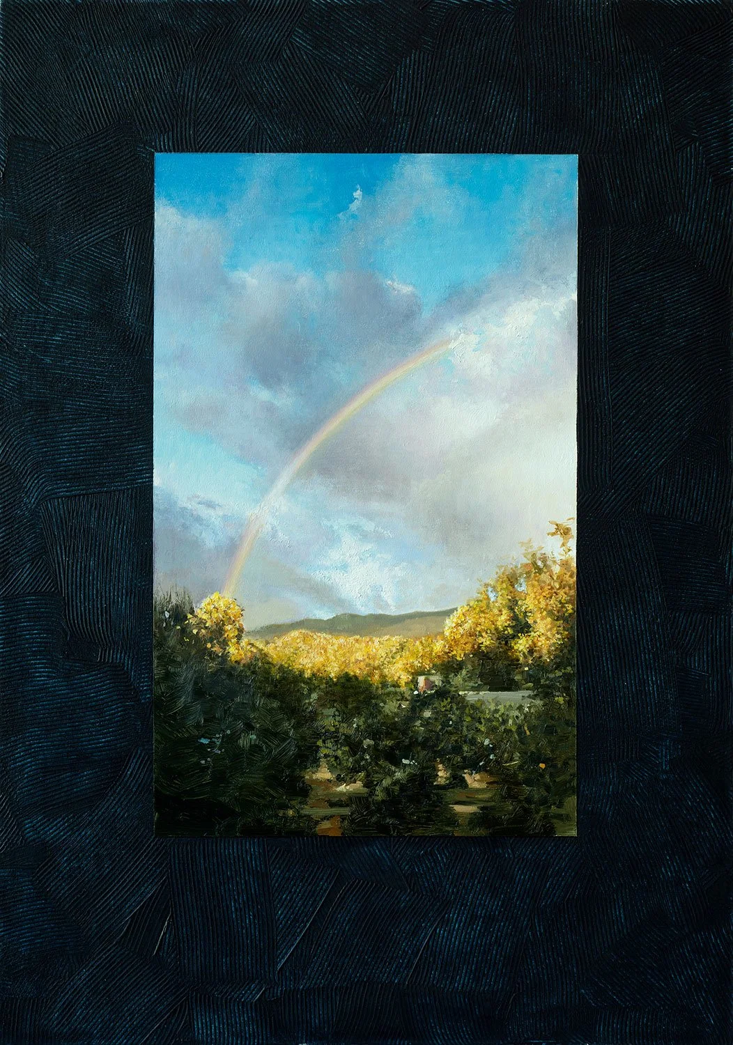 Landscape painting of a rainbow over trees with a blue sky and clouds, framed by a dark textured border.