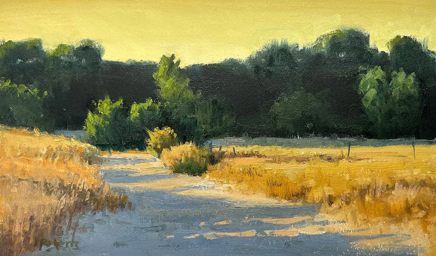 Landscape painting of a dirt road winding through a field of dry grass with trees in the background under a yellow sky.
