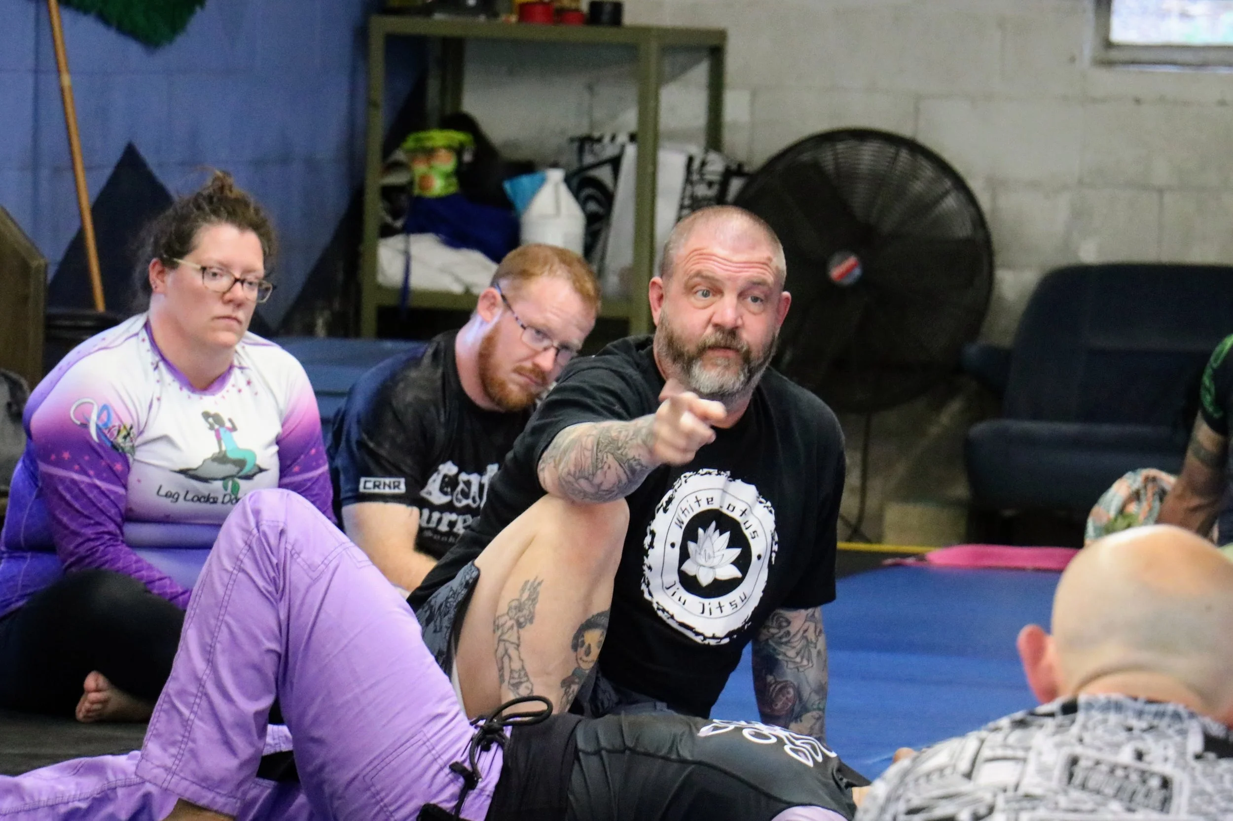BJJ black belt instructor Jesse Walker coaching at Rough Hands BJJ Louisville