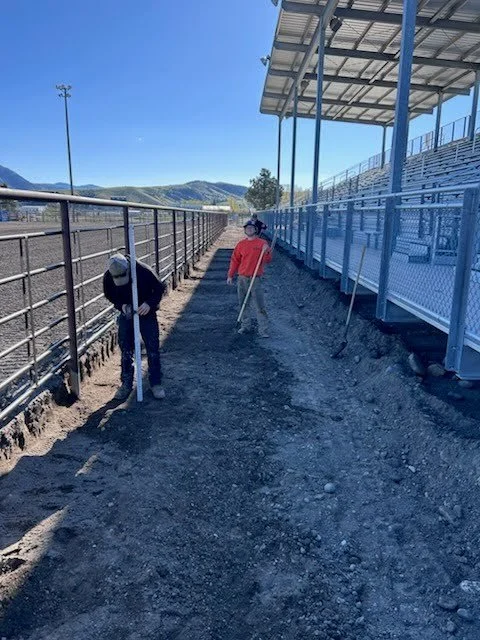 After excavation, the crew levels and compacts the ground to prep for the base layer