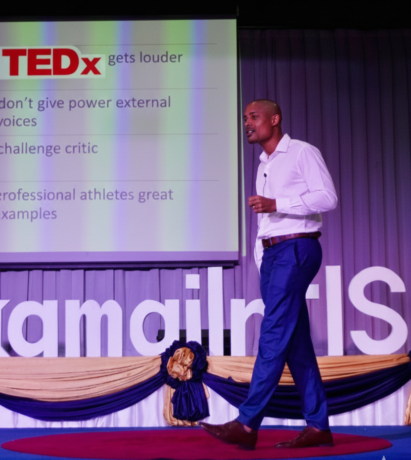 Kyle Daniels giving his second Tedx talk on resilience and learning to lose