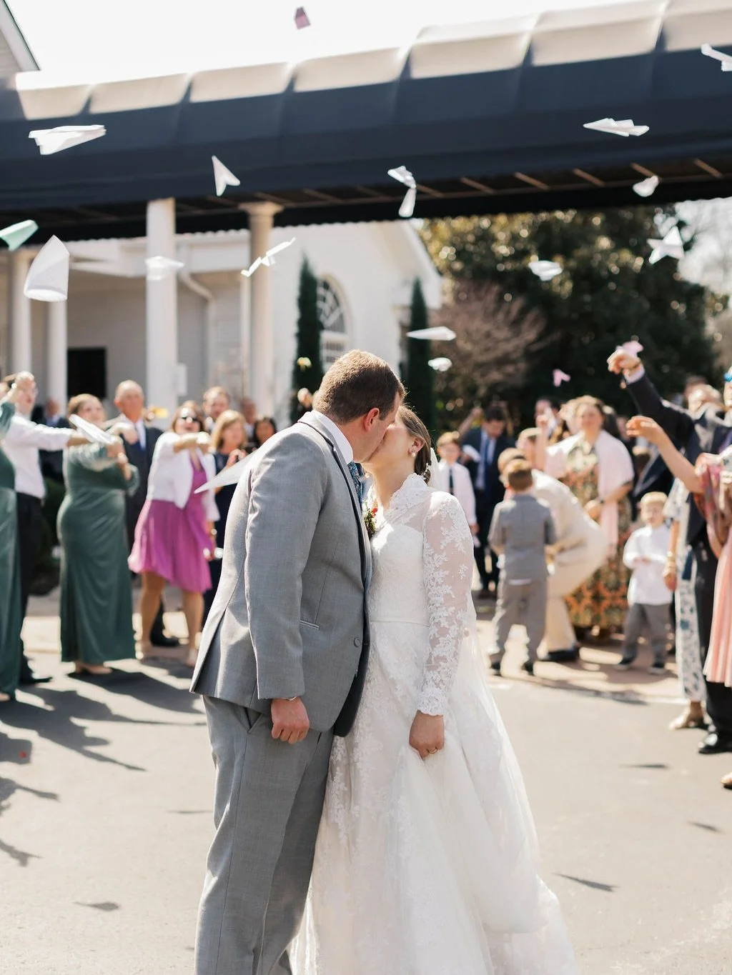 Paper airplanes for the newlywed send off! ✈️🎉 In honor of the groom being a pilot the wedding guests made paper airplanes during cocktail hour and launched them as the couple soared into their new chapter! 
 &bull;&bull;&bull;
#eventsbyjulie #kywed