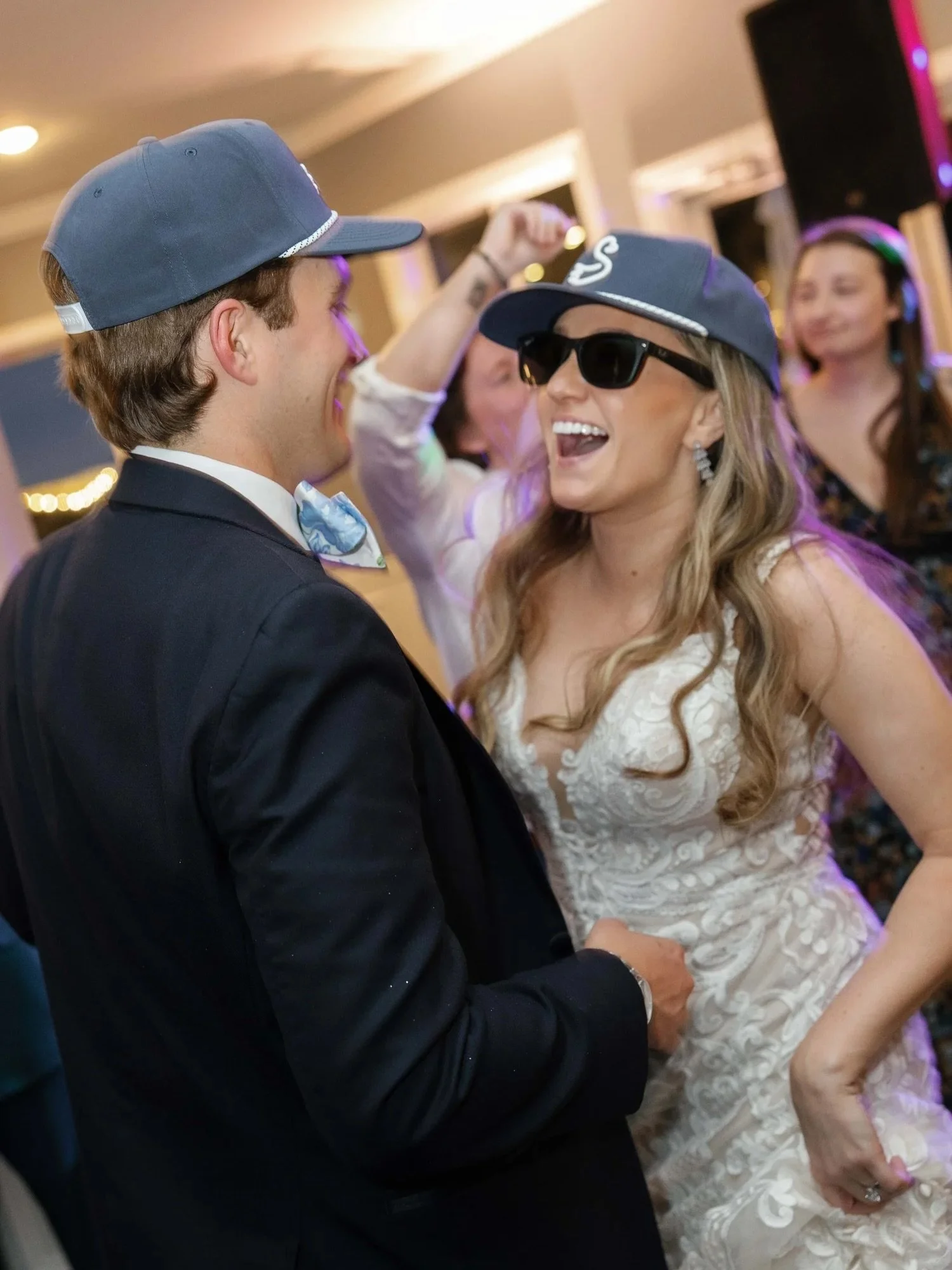 Embracing the new last name!

With an elegant last name like Swan, Kellie and Anderson incorporated swan elements in their wedding day. From party favor hats and koozies, groomsmen matching socks, and a napkin holder, swan decor was elegantly placed 