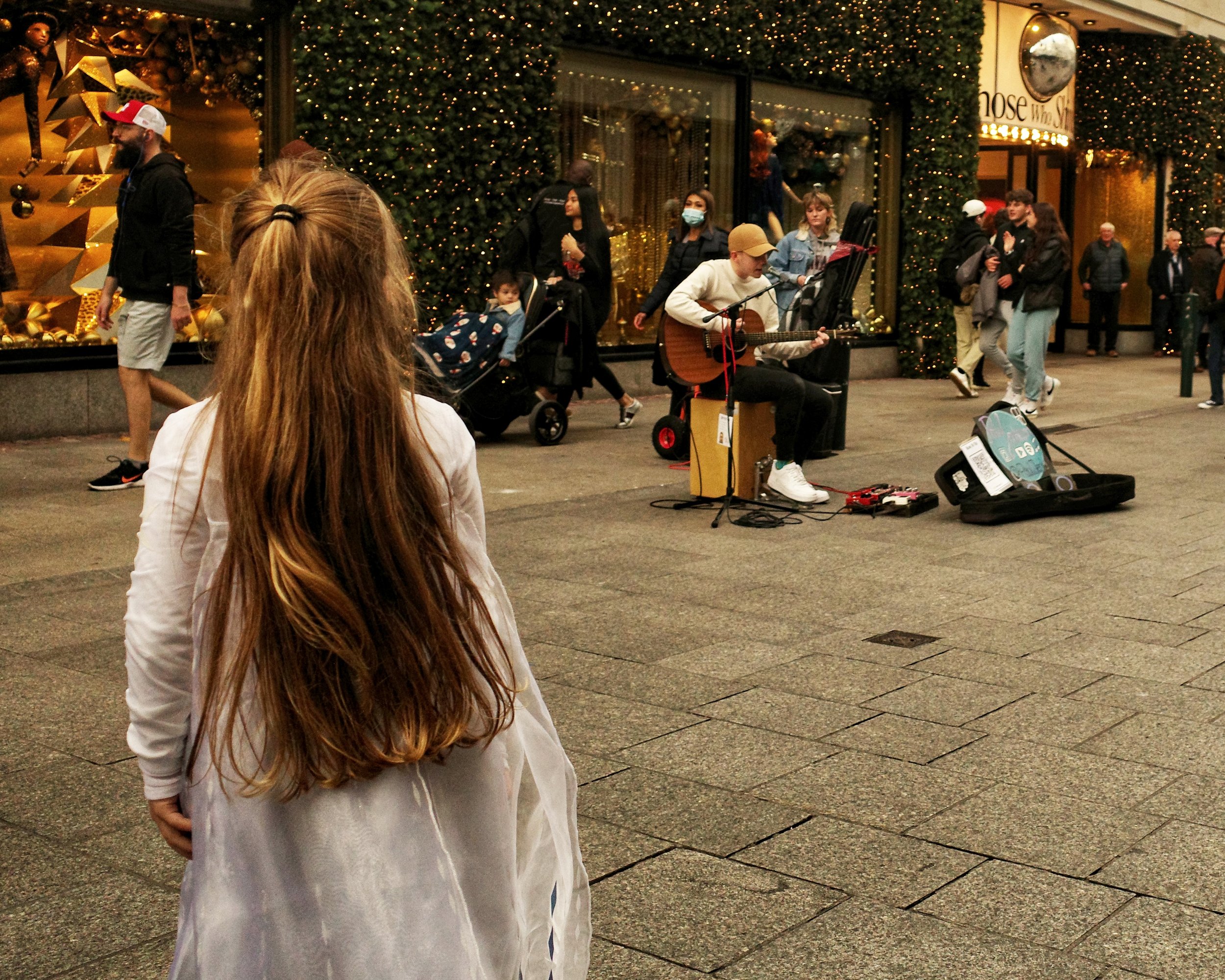 Girl Watching Buskers.jpeg