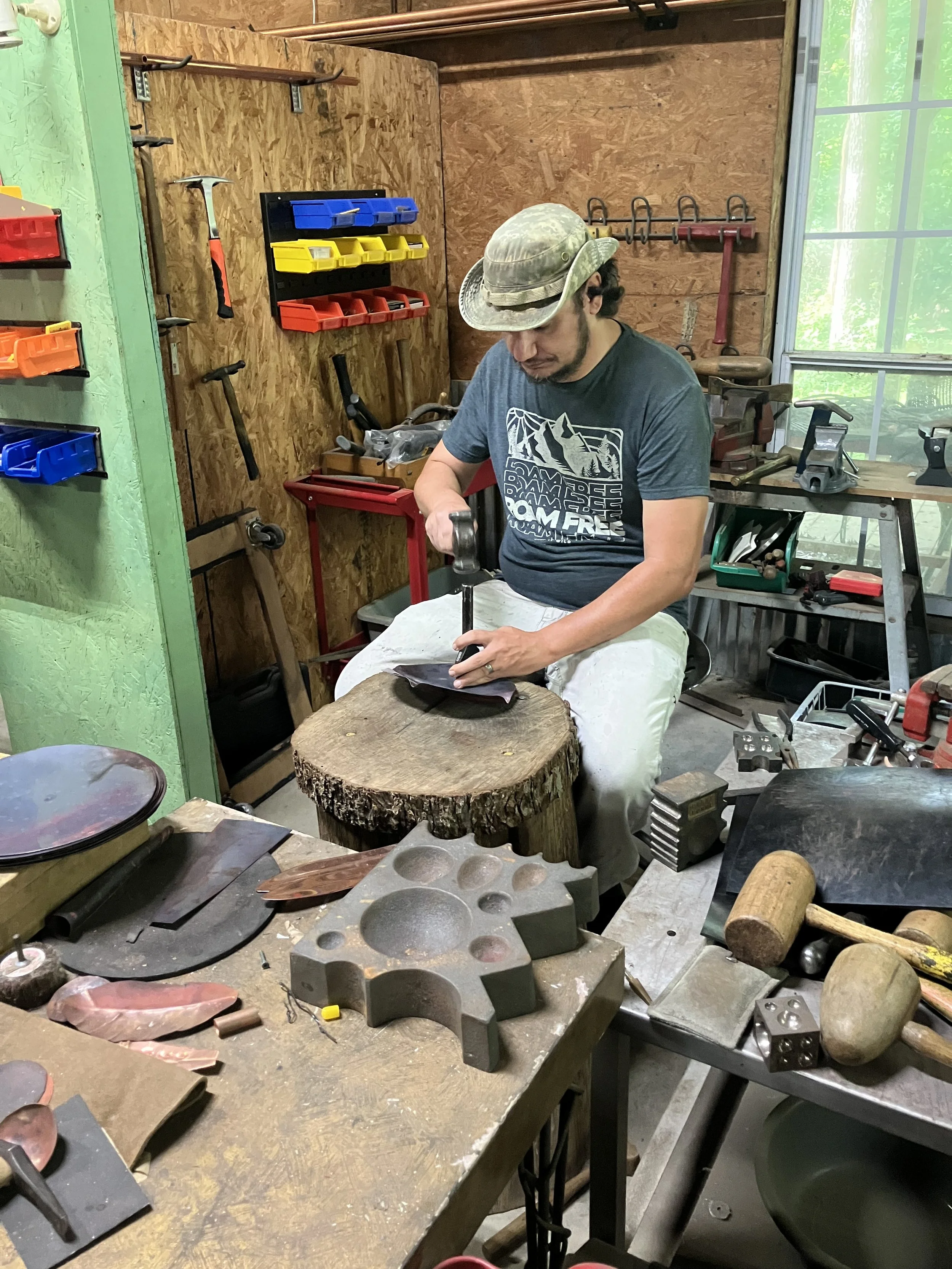 Dan making a copper bowl