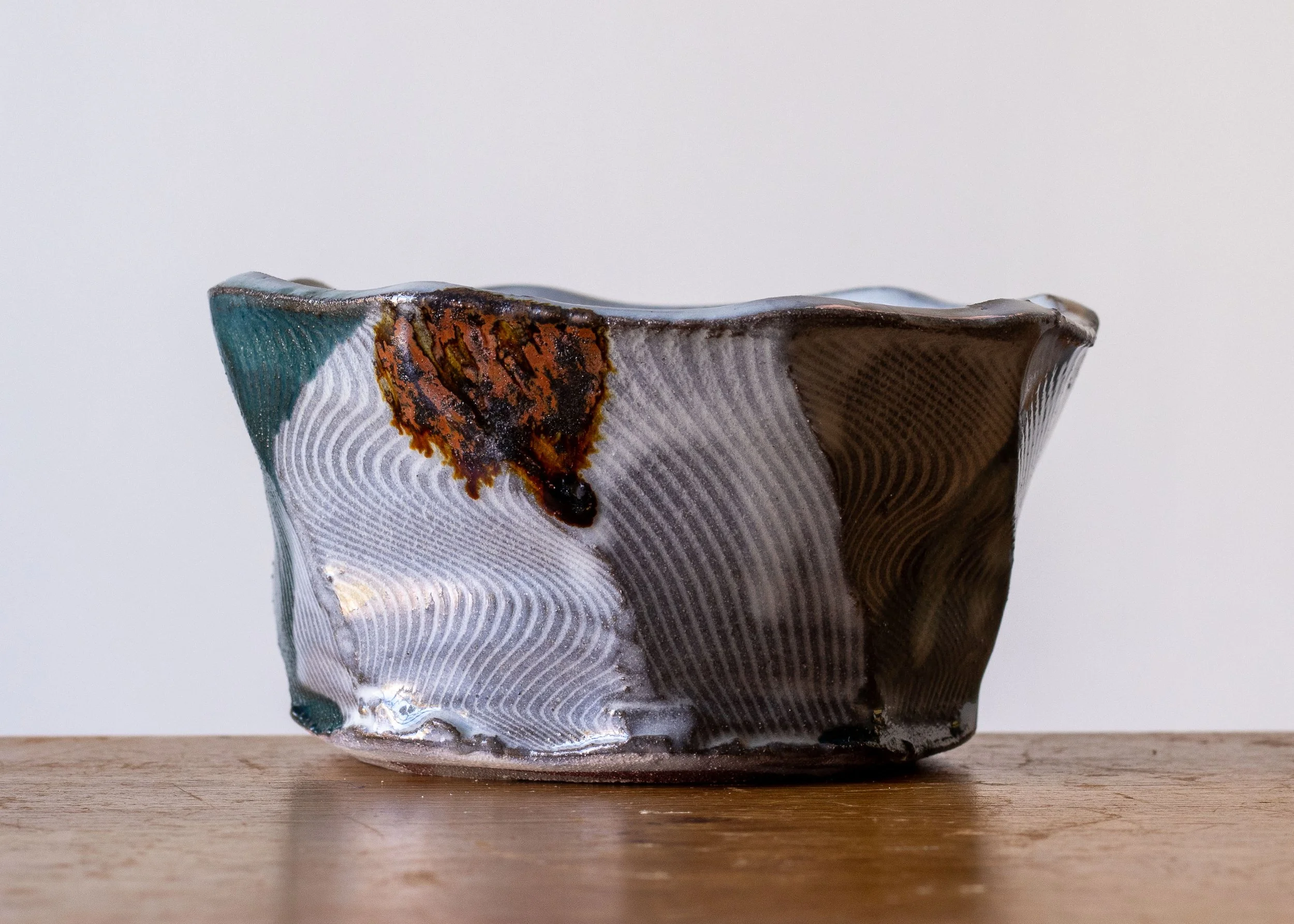 Handmade Pottery Faceted Bowl with Turquoise Brush Marks, view 3.jpg