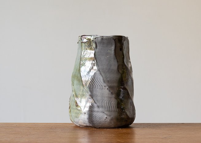 Faceted vase with green brush marks, view 1.jpg