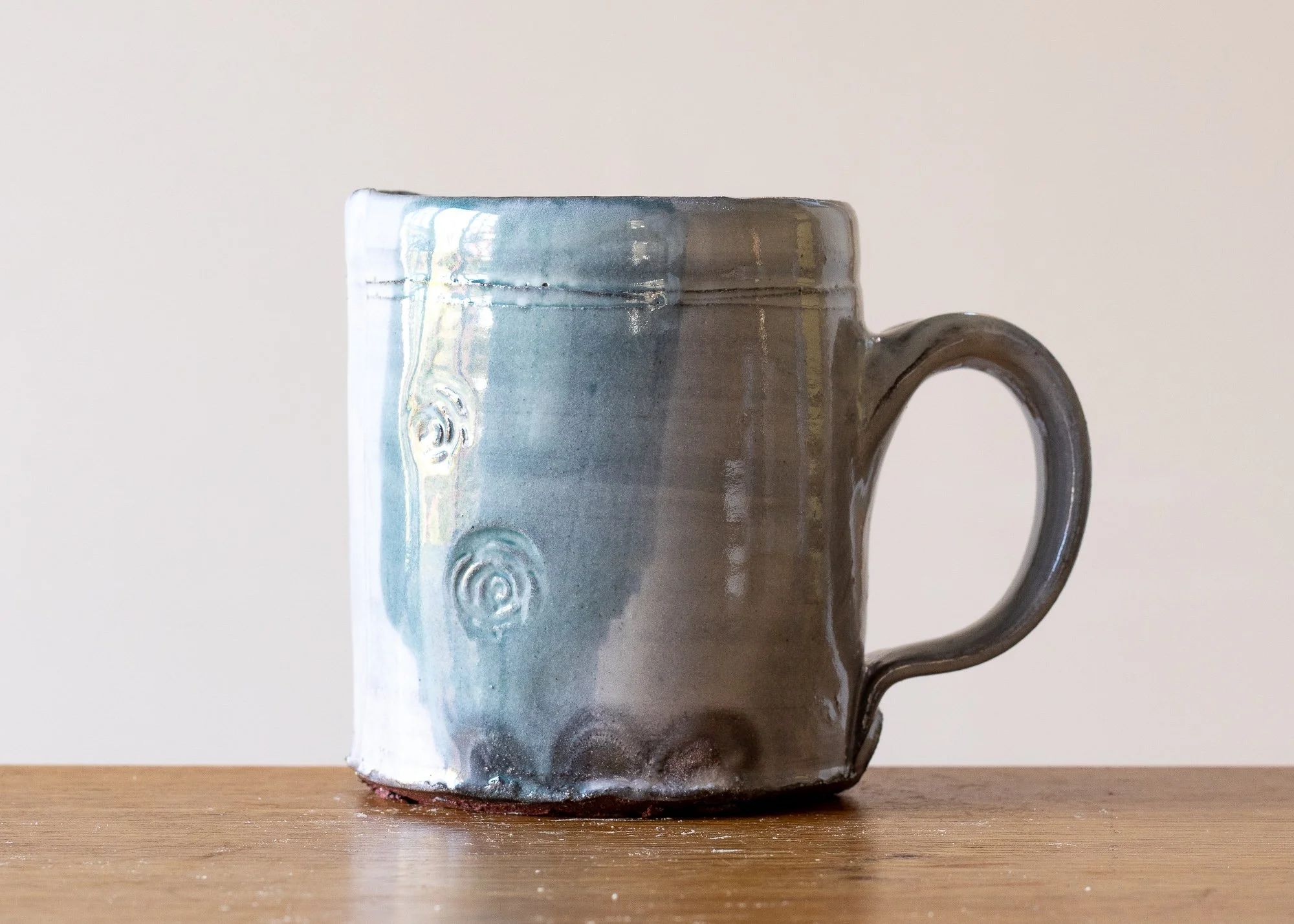 Small Handmade Pottery Coffee Cup with Turquoise Brushed Decoration.jpg