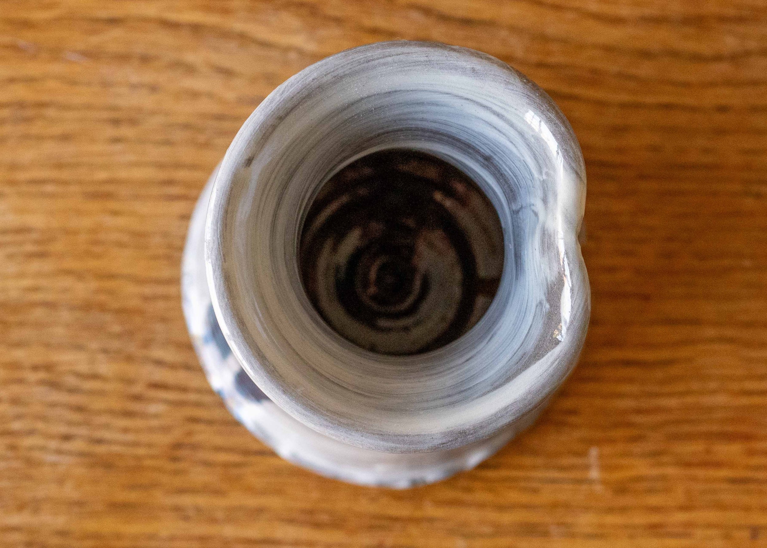 Small handmade stoneware vase with blue brushmarks #5, view from above.jpg