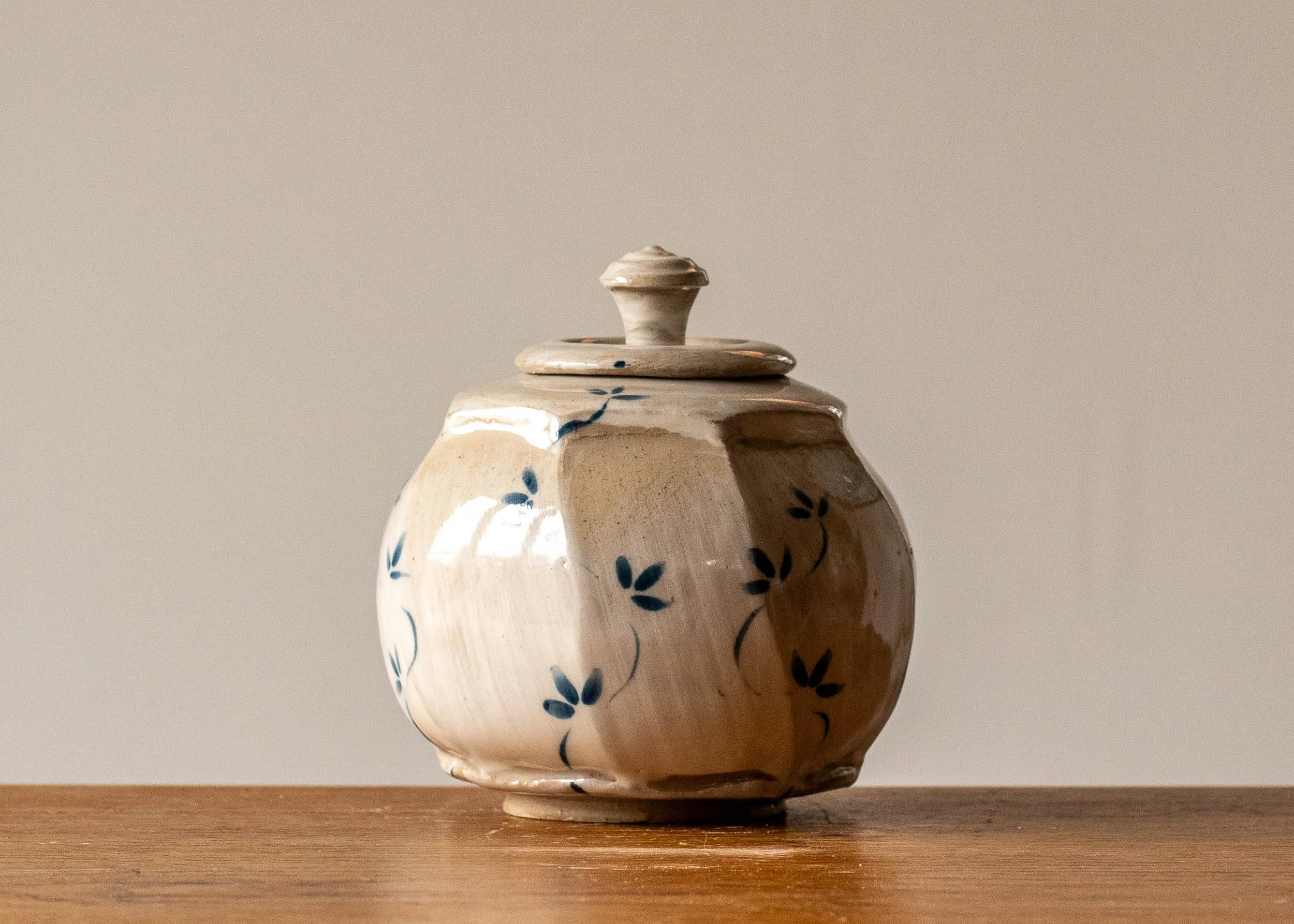 Small Faceted Lidded Pot with Leaf Decoration, view 1.jpg