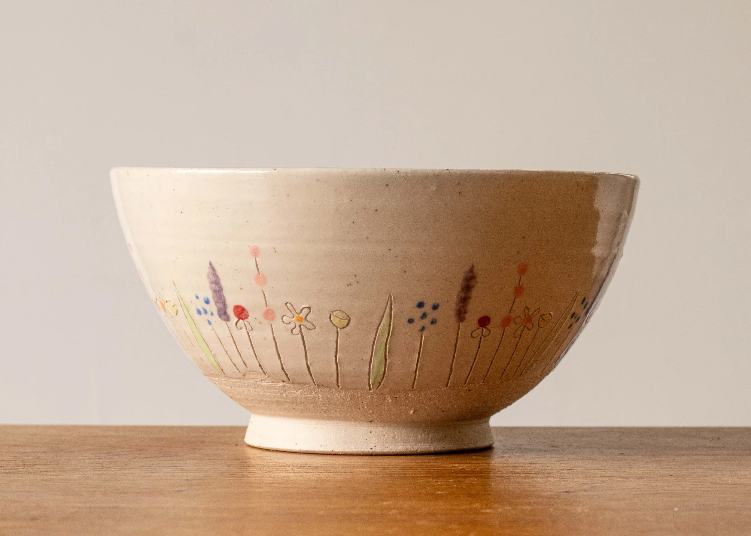 Medium Handmade Bowl with Midsummer Flower Design, side 1.jpg