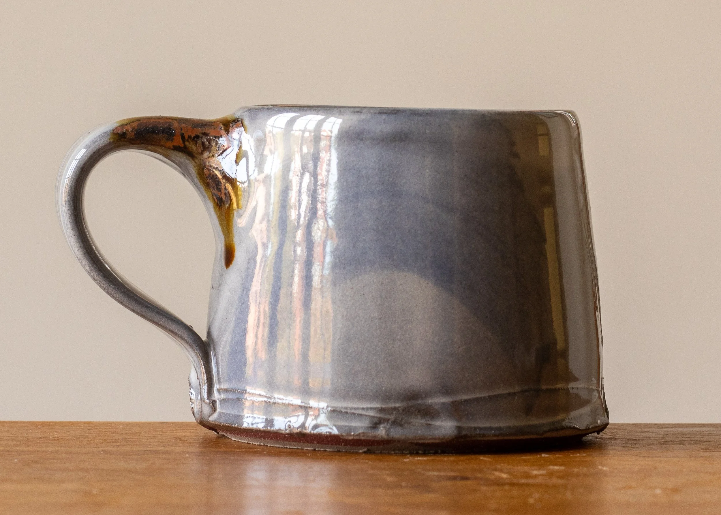 Handmade Pottery Coffee Cup with Blue Brush Marks, view 3.jpg
