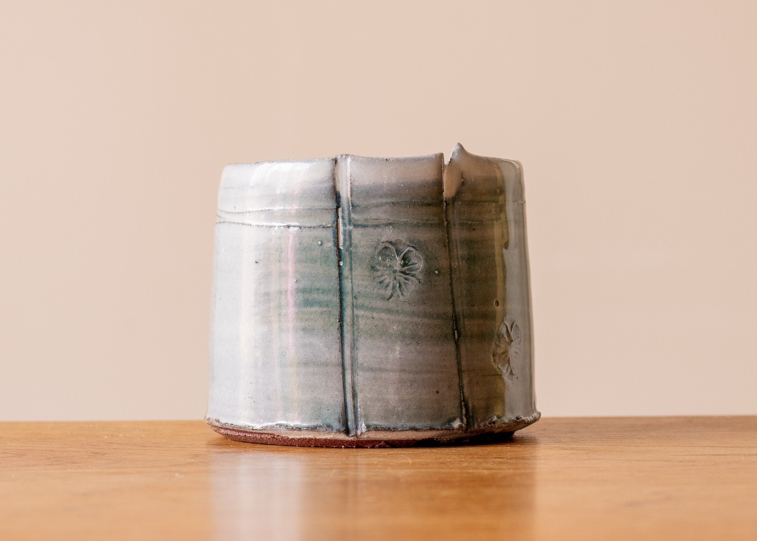 Handmade Pottery Coffee Cup with blue-green and impressed decoration, side 2.jpg