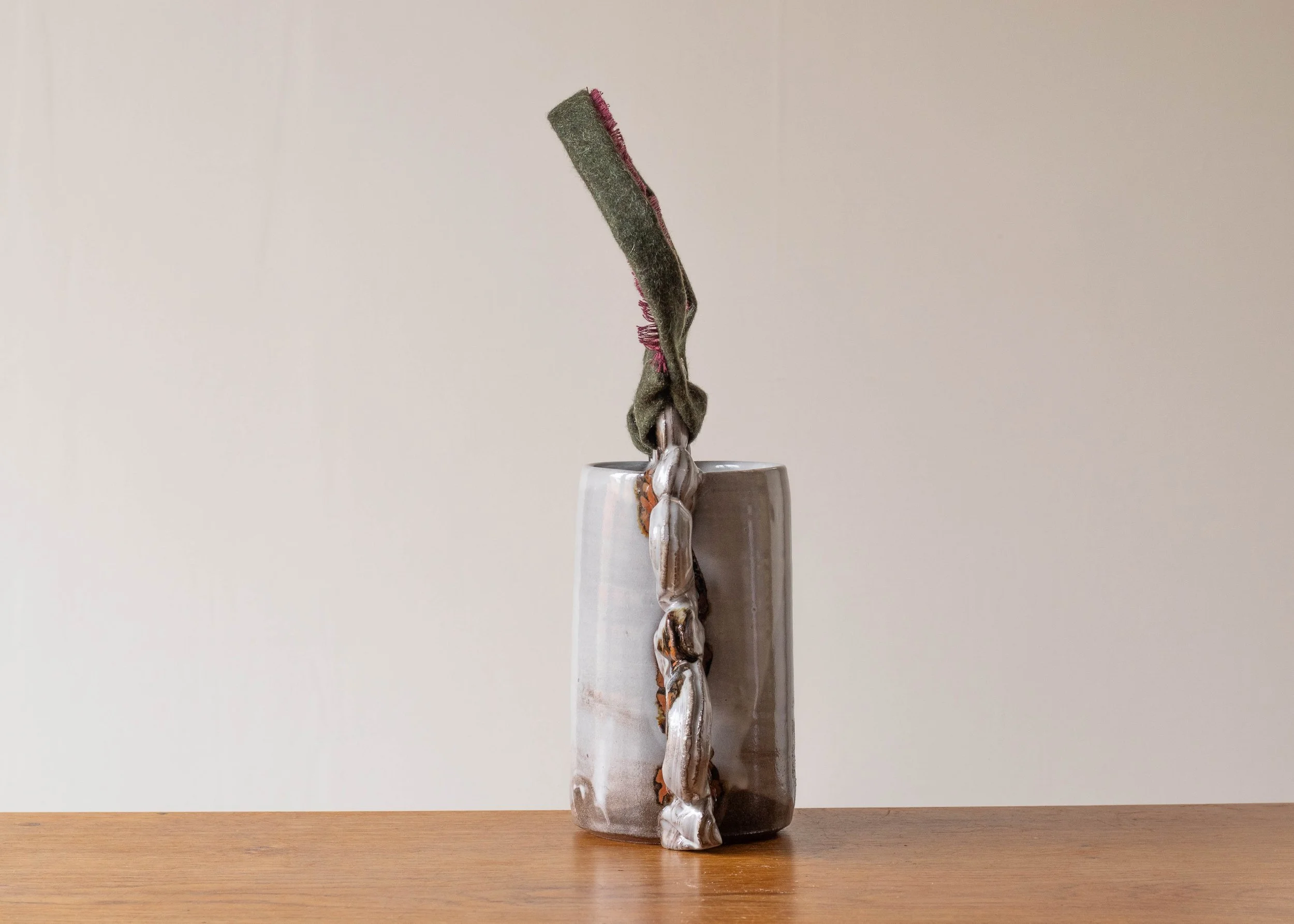 Decorative vessel with textile handle, view 3.jpg